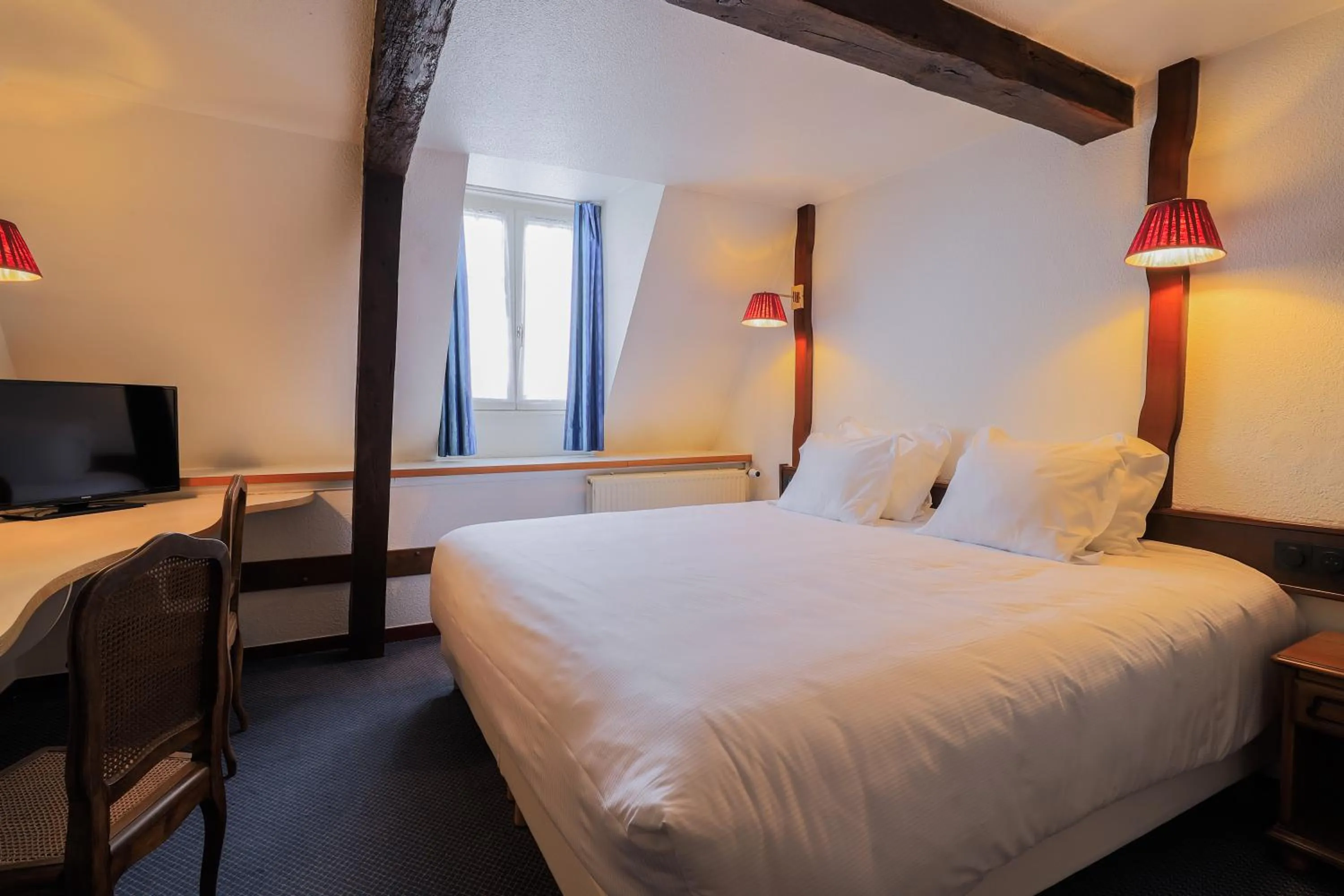 Bed in Hôtel Les Trois Luppars