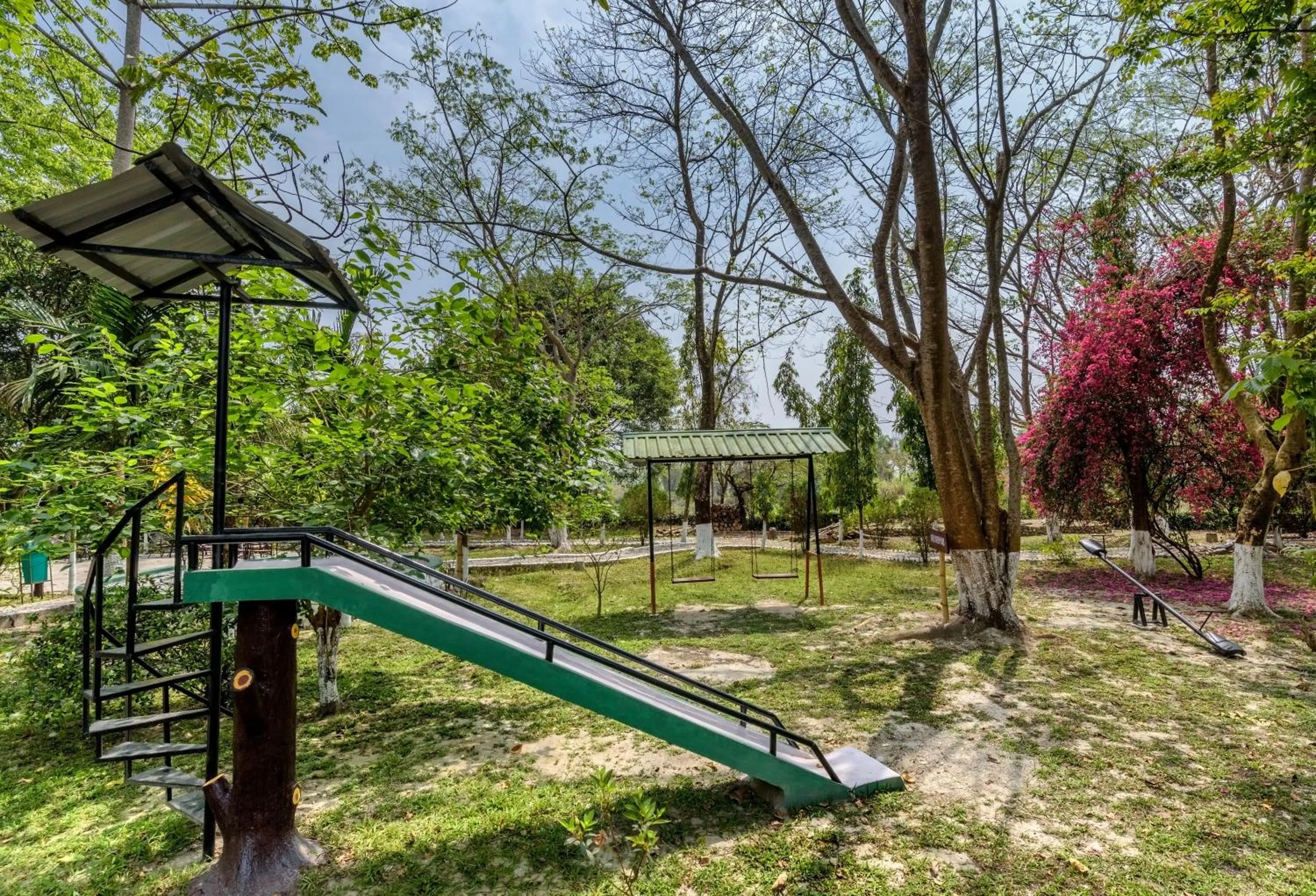 Children play ground in The Riverwood Forest Retreat Dooars - fully vaccinated staff