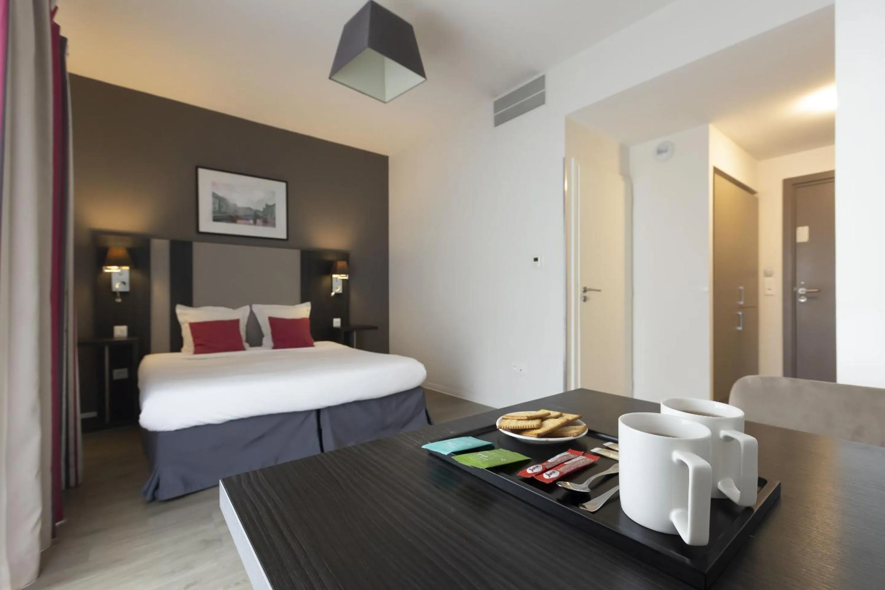 Bedroom, Bed in Appart Hotel Odalys City Colmar La Rose d'Argent