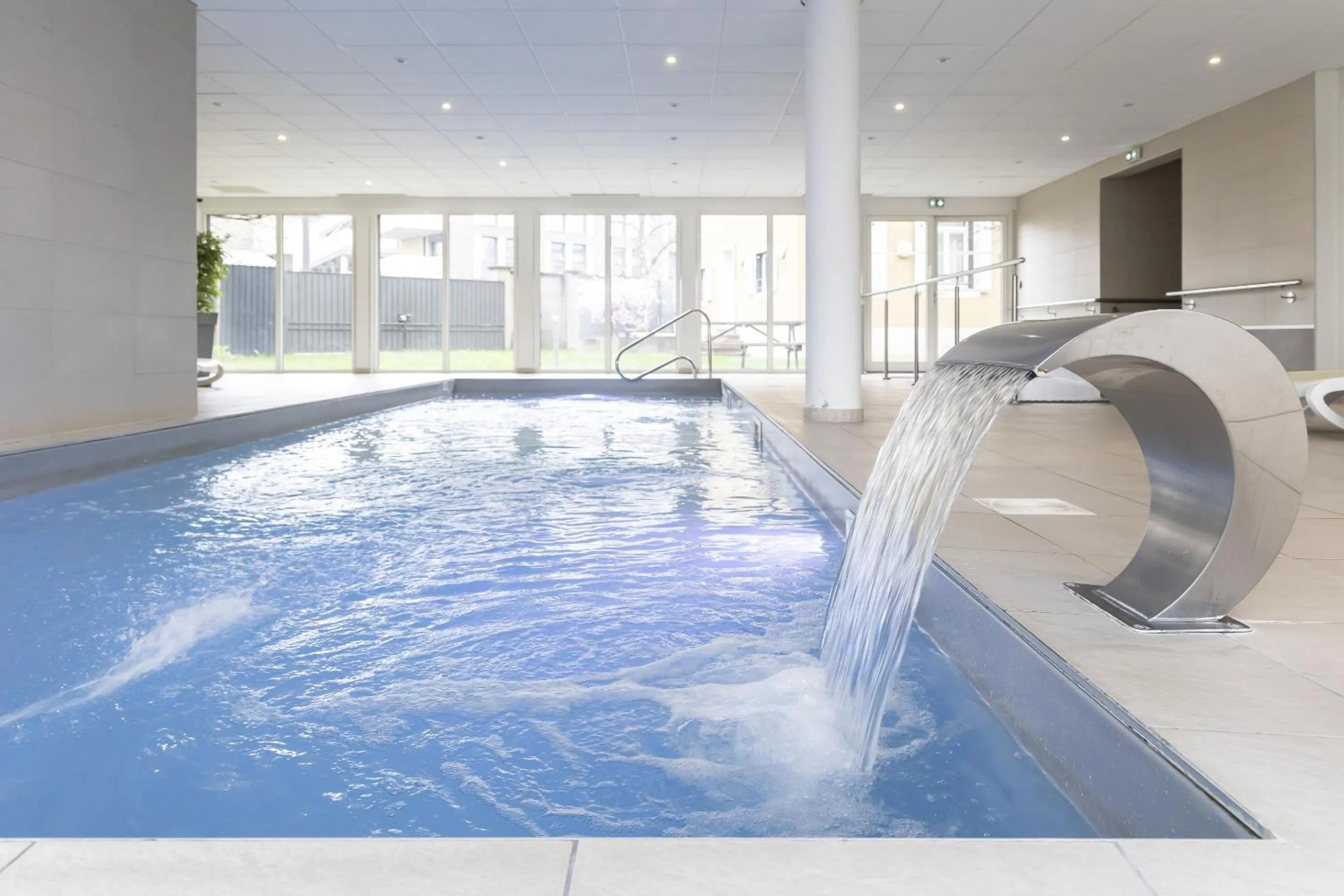 Swimming pool in Appart Hotel Odalys City Colmar La Rose d'Argent