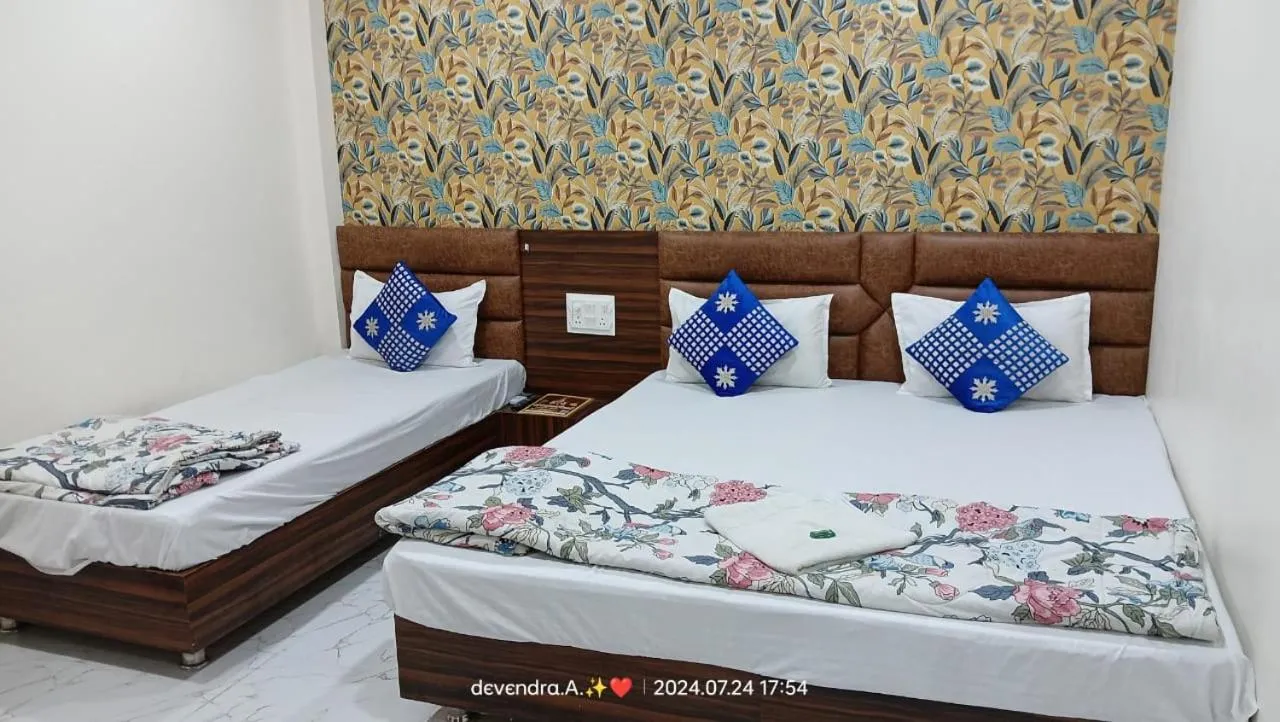 Bed in Hotel Ganga Sagar