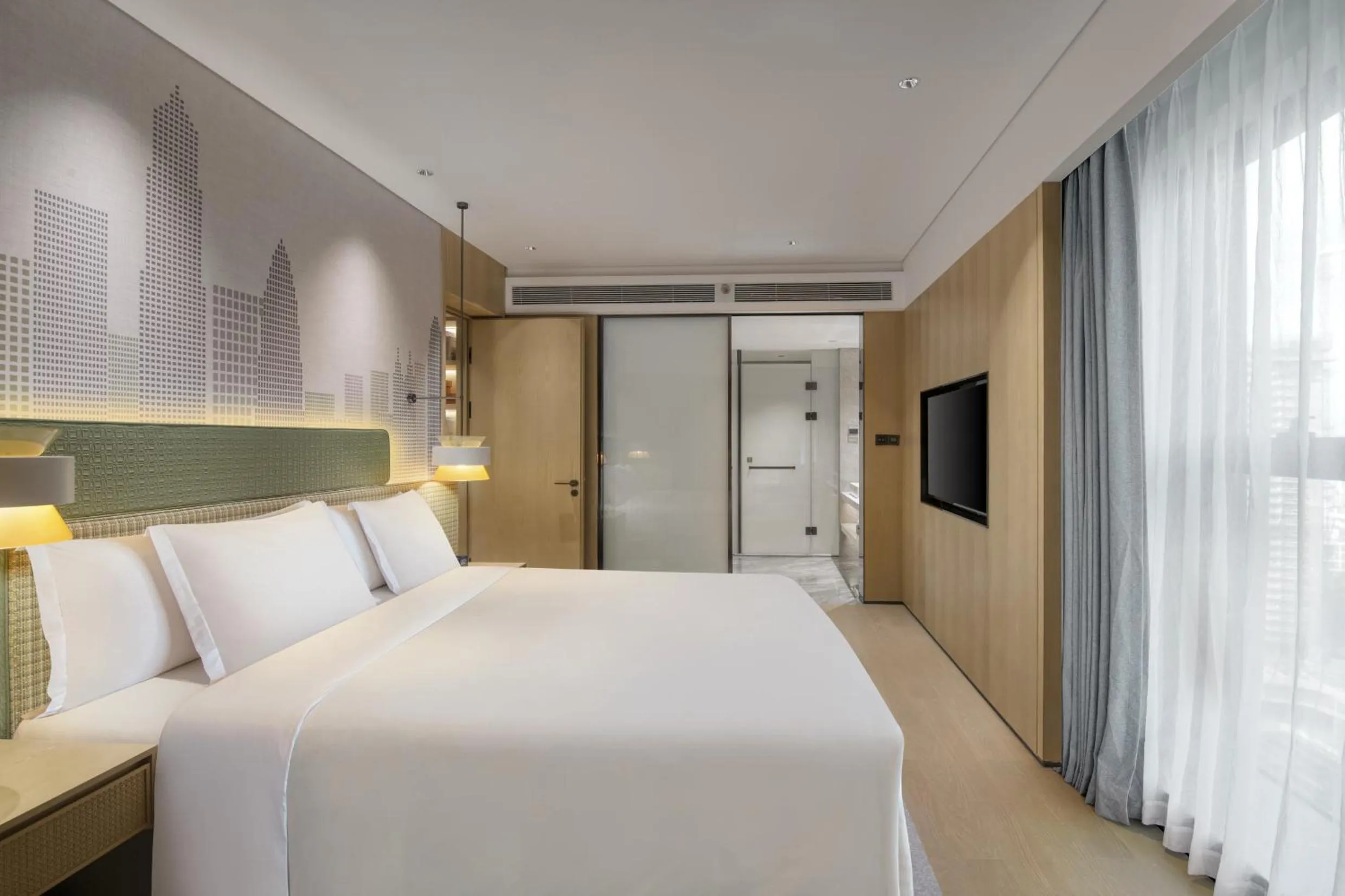 Bed in Holiday Inn Shenzhen Nanshan by IHG