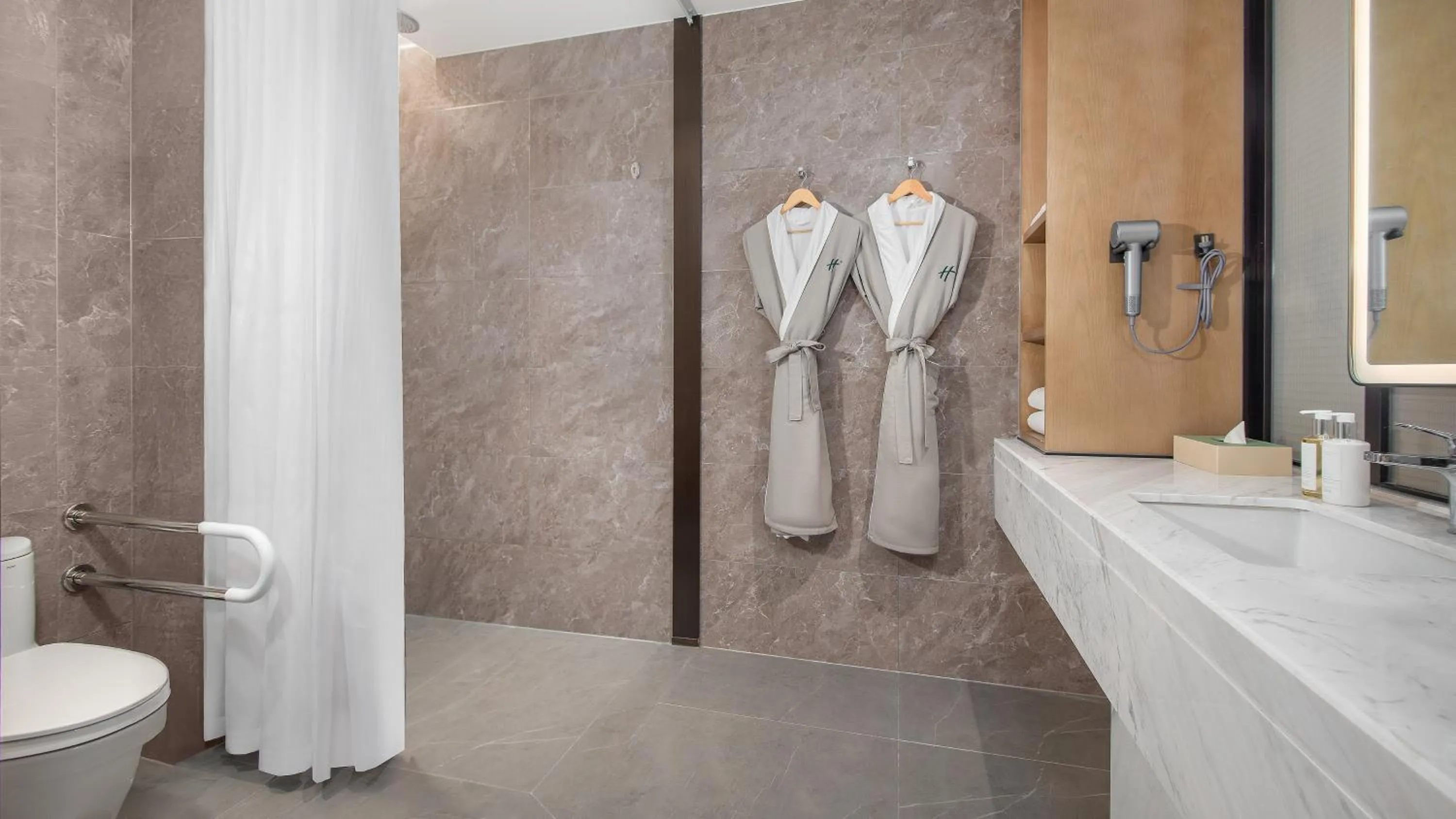 Toilet in Holiday Inn Wuhan Houguan Lake by IHG