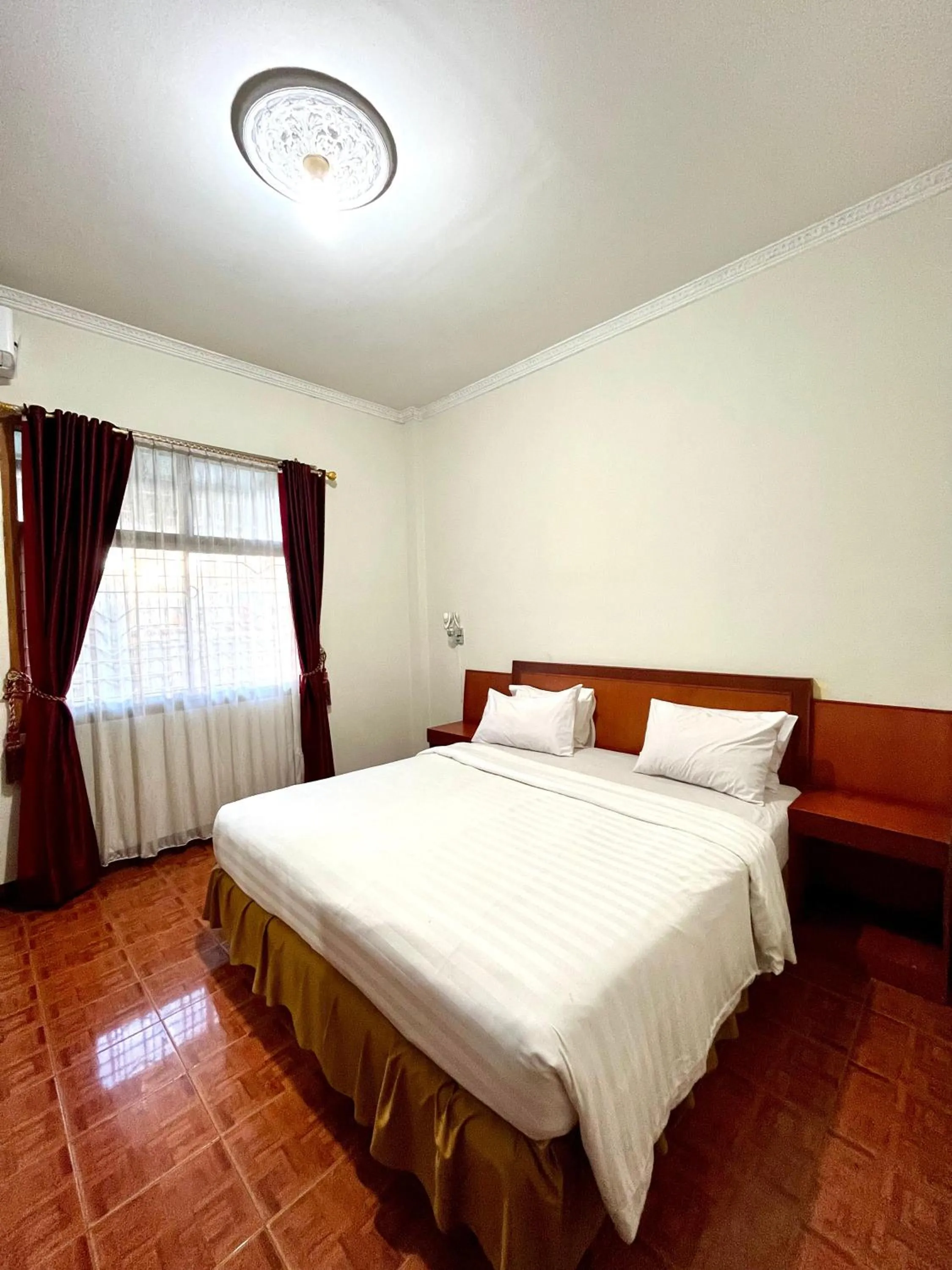 Bed in Soeltan Luxe Hotel Lampung