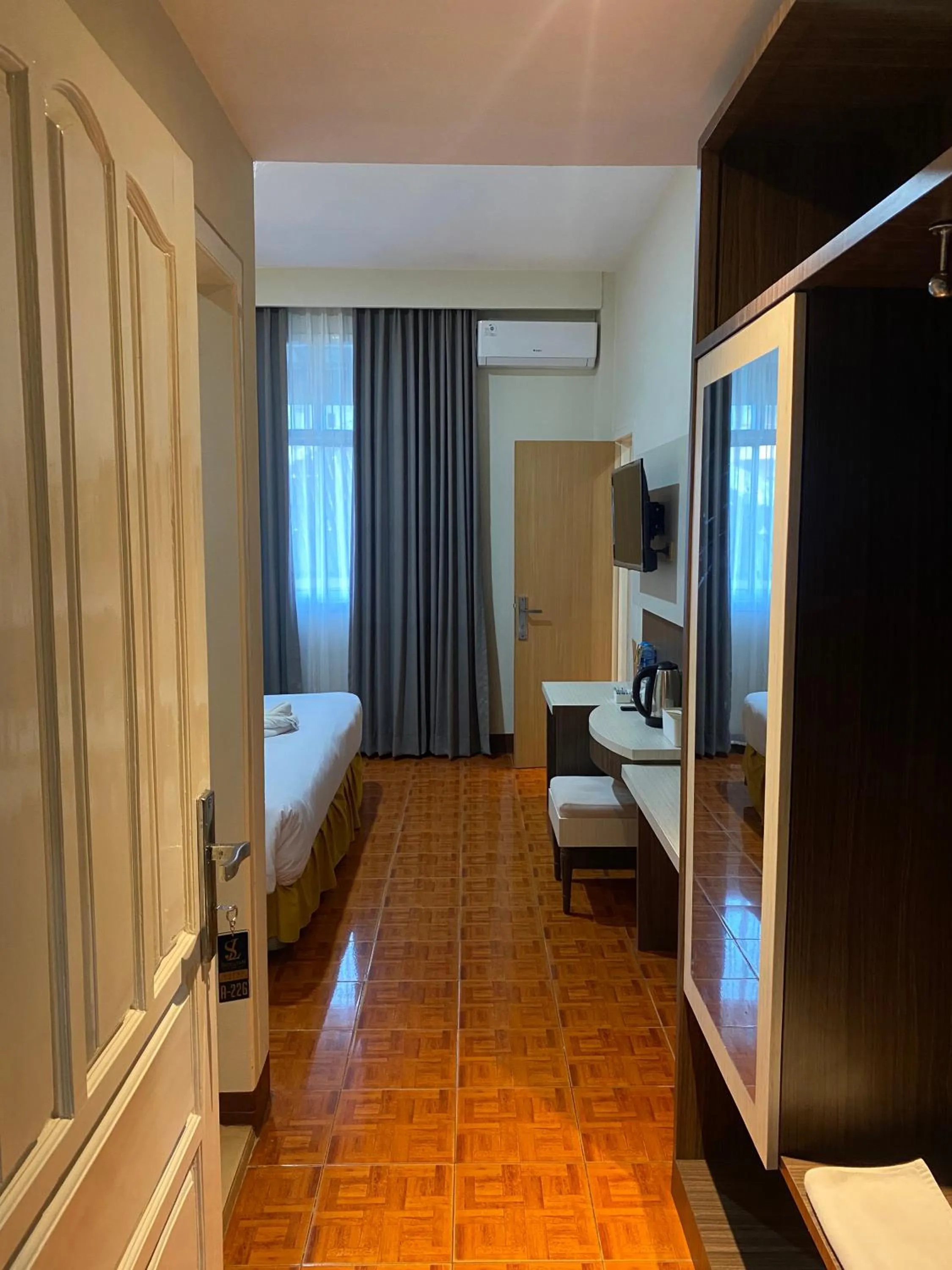 Bed in Soeltan Luxe Hotel Lampung