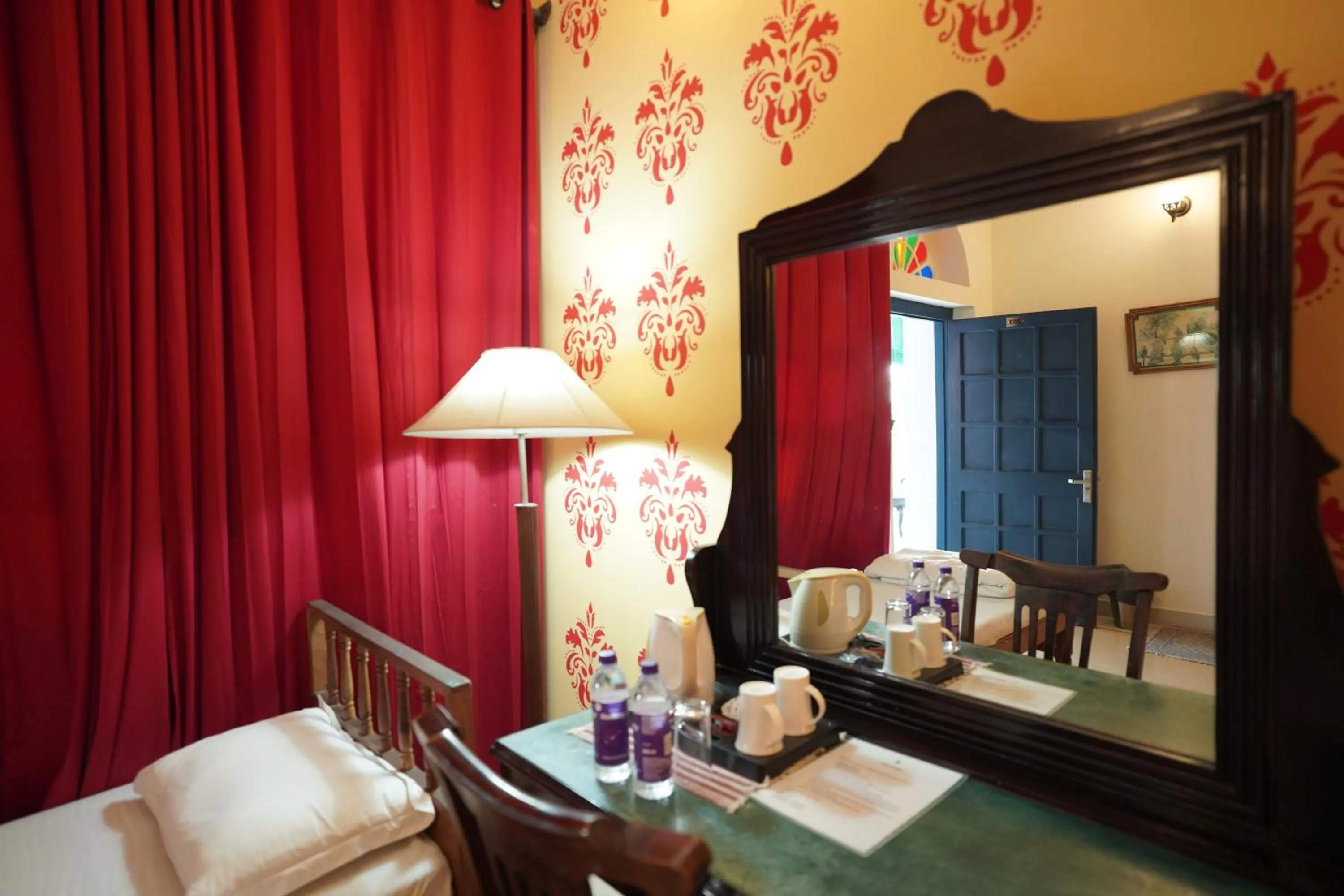 Bed in Haveli Kalwara - A Heritage Hotel