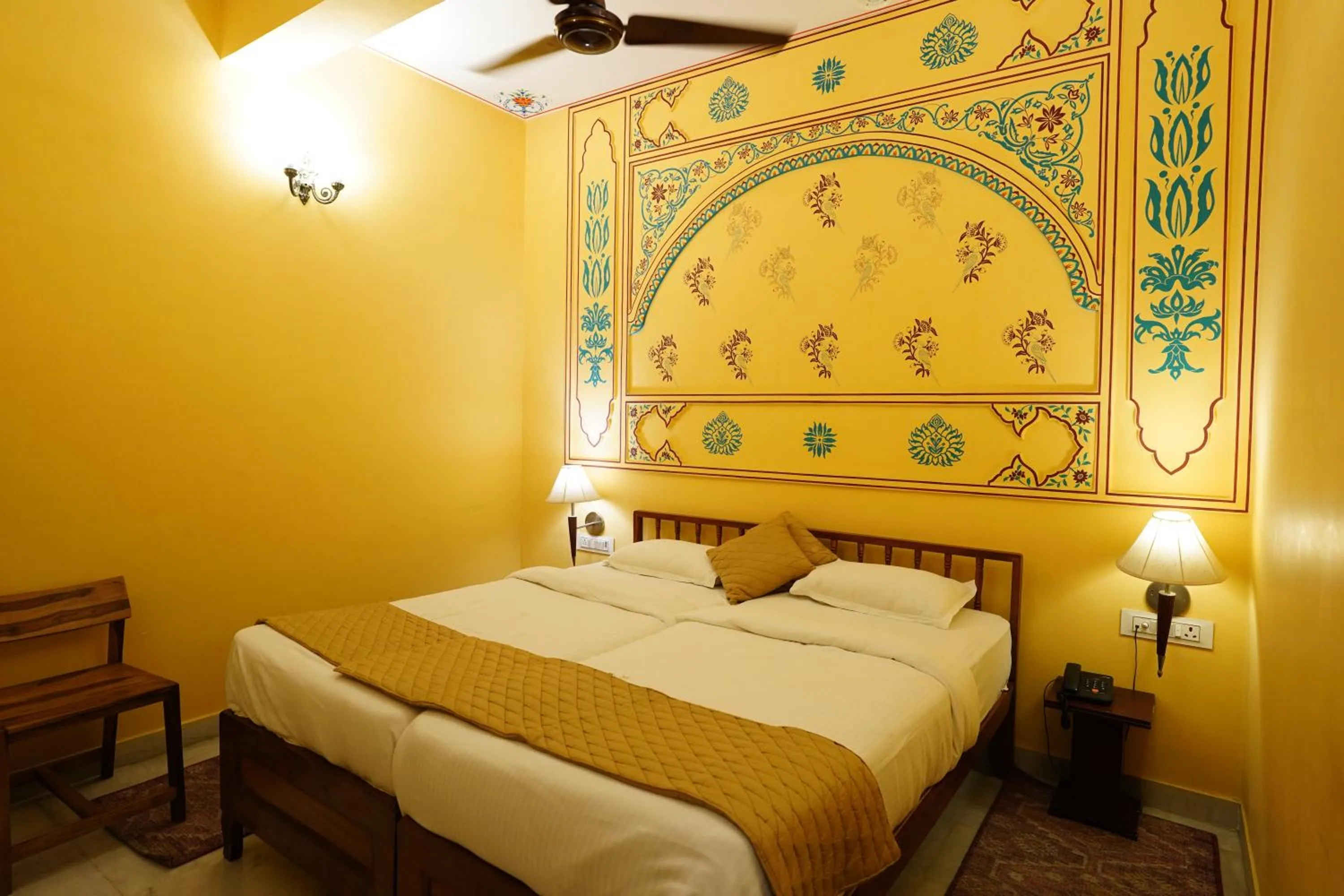 Bed in Haveli Kalwara - A Heritage Hotel