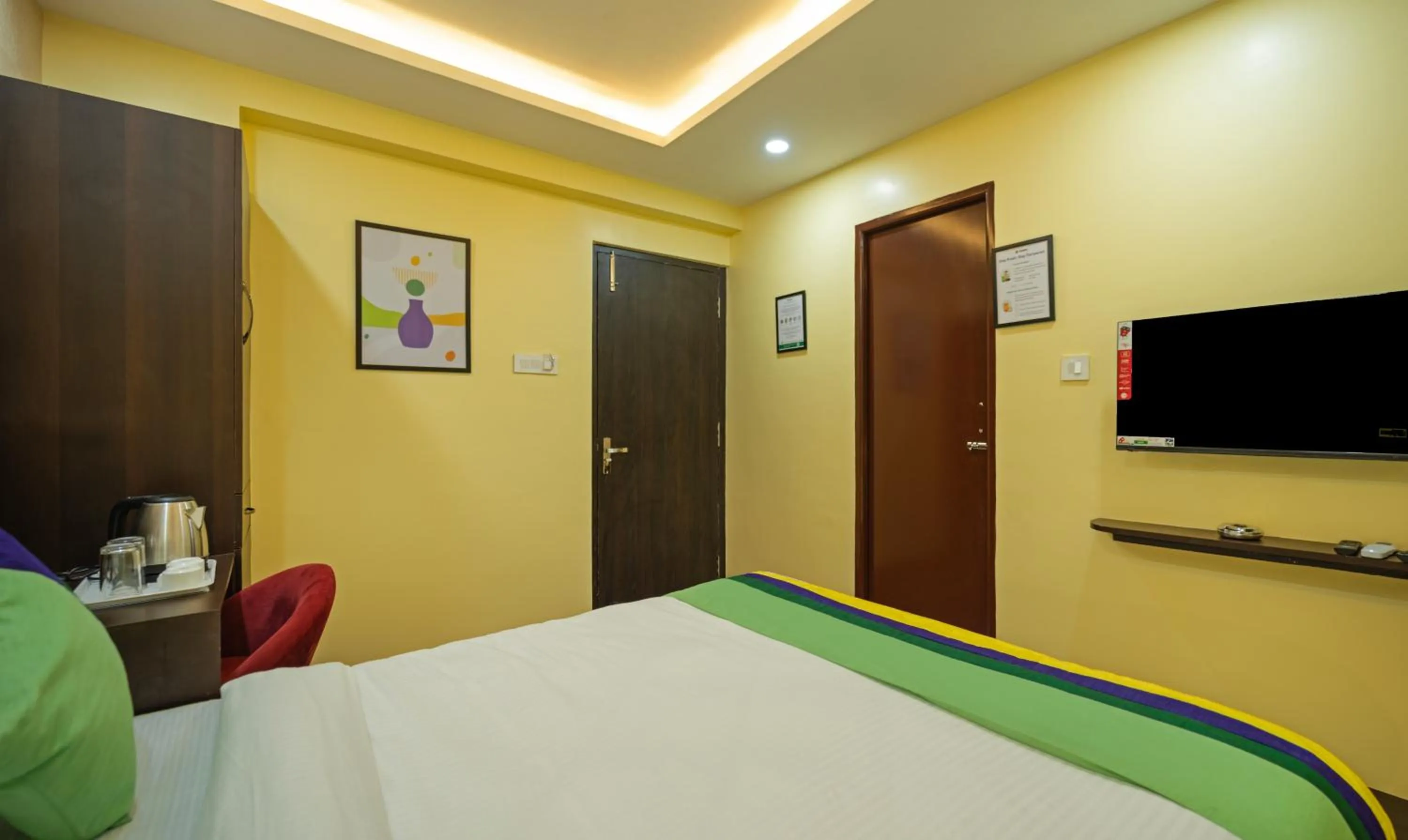 Bedroom, Bed in Treebo Taj Square, 10 Mins From Airport