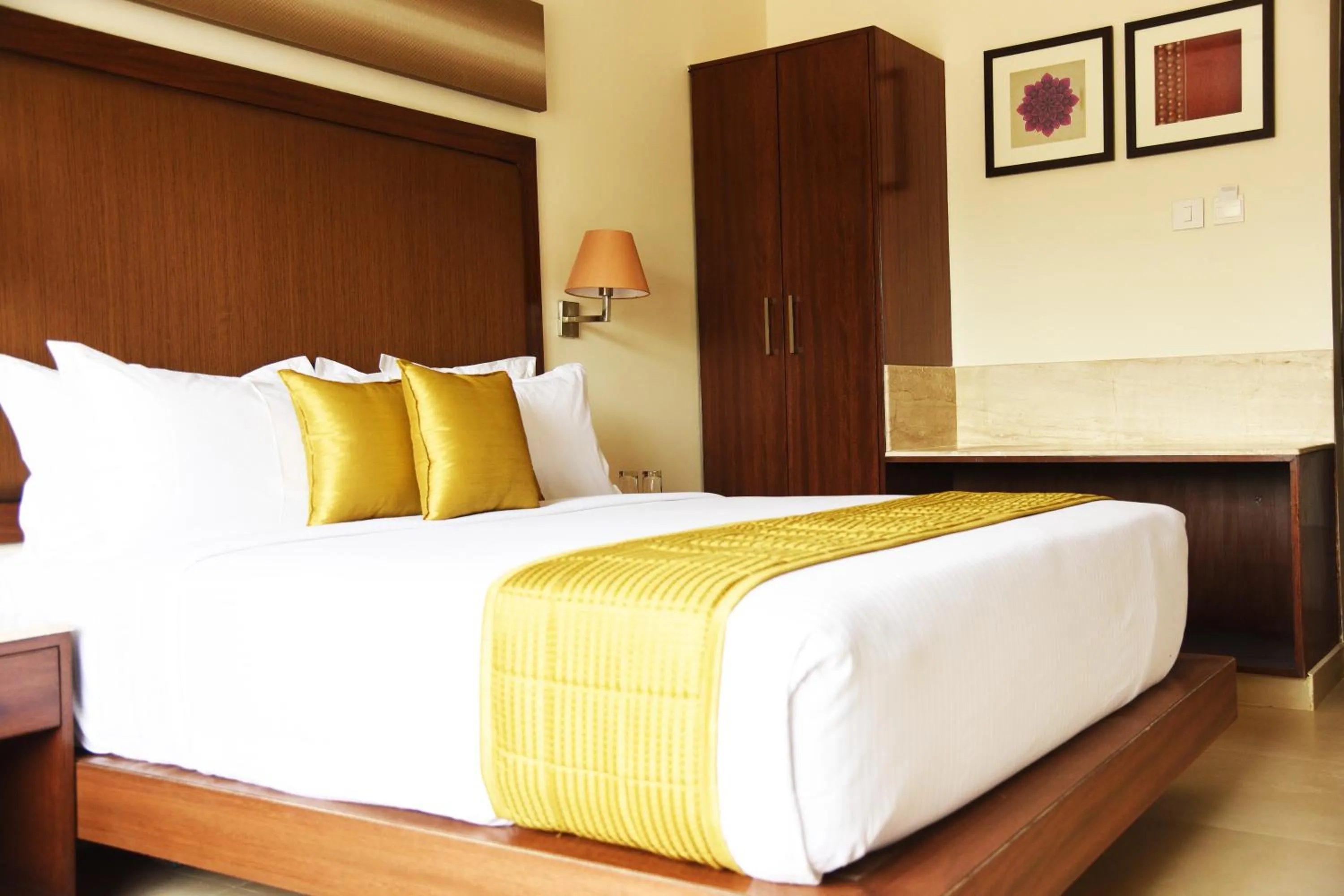 Bed in Hotel Rameswaram Grand