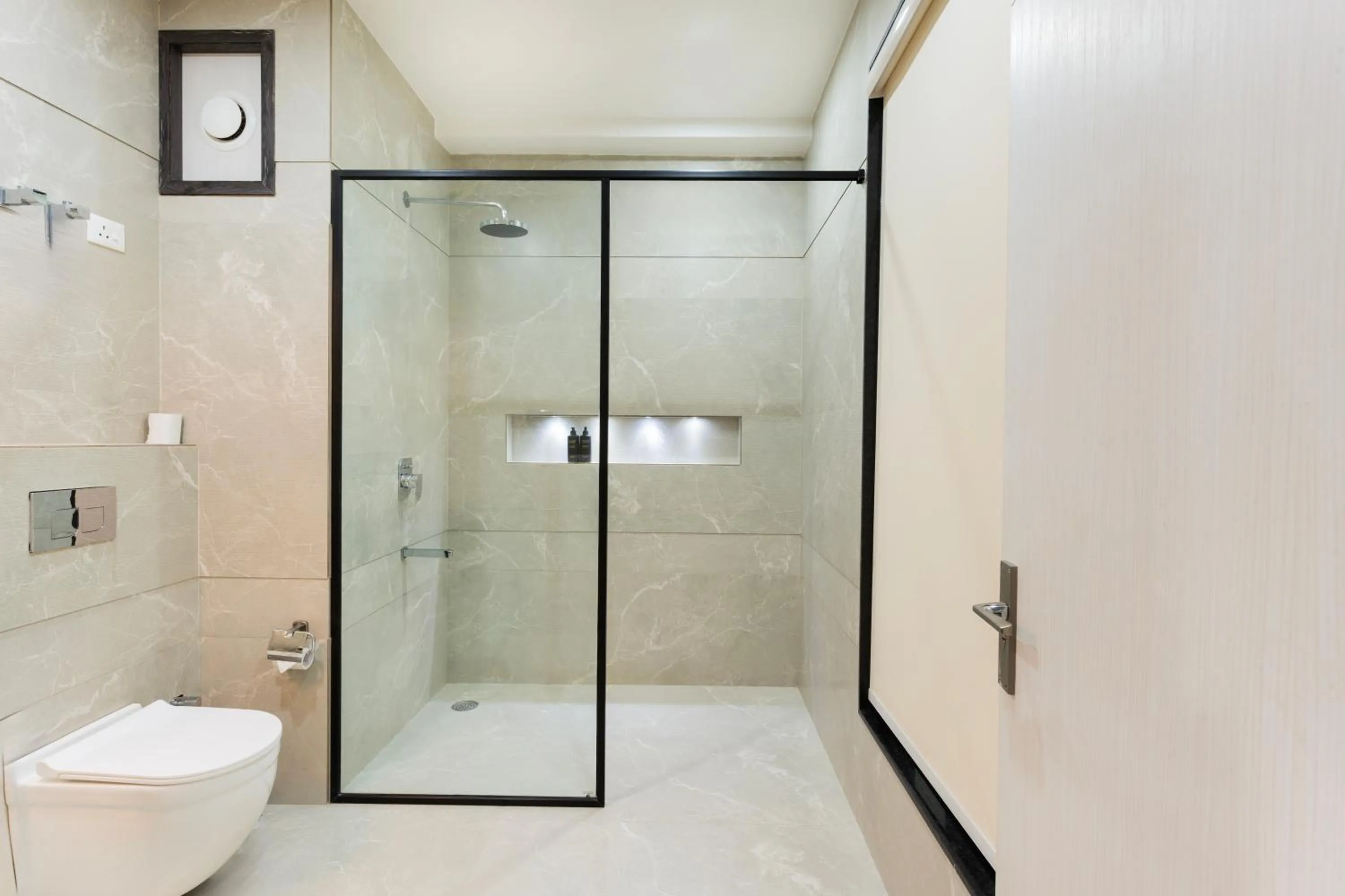 Shower in Hotel Elinor By Dazzling Hotels & Resorts