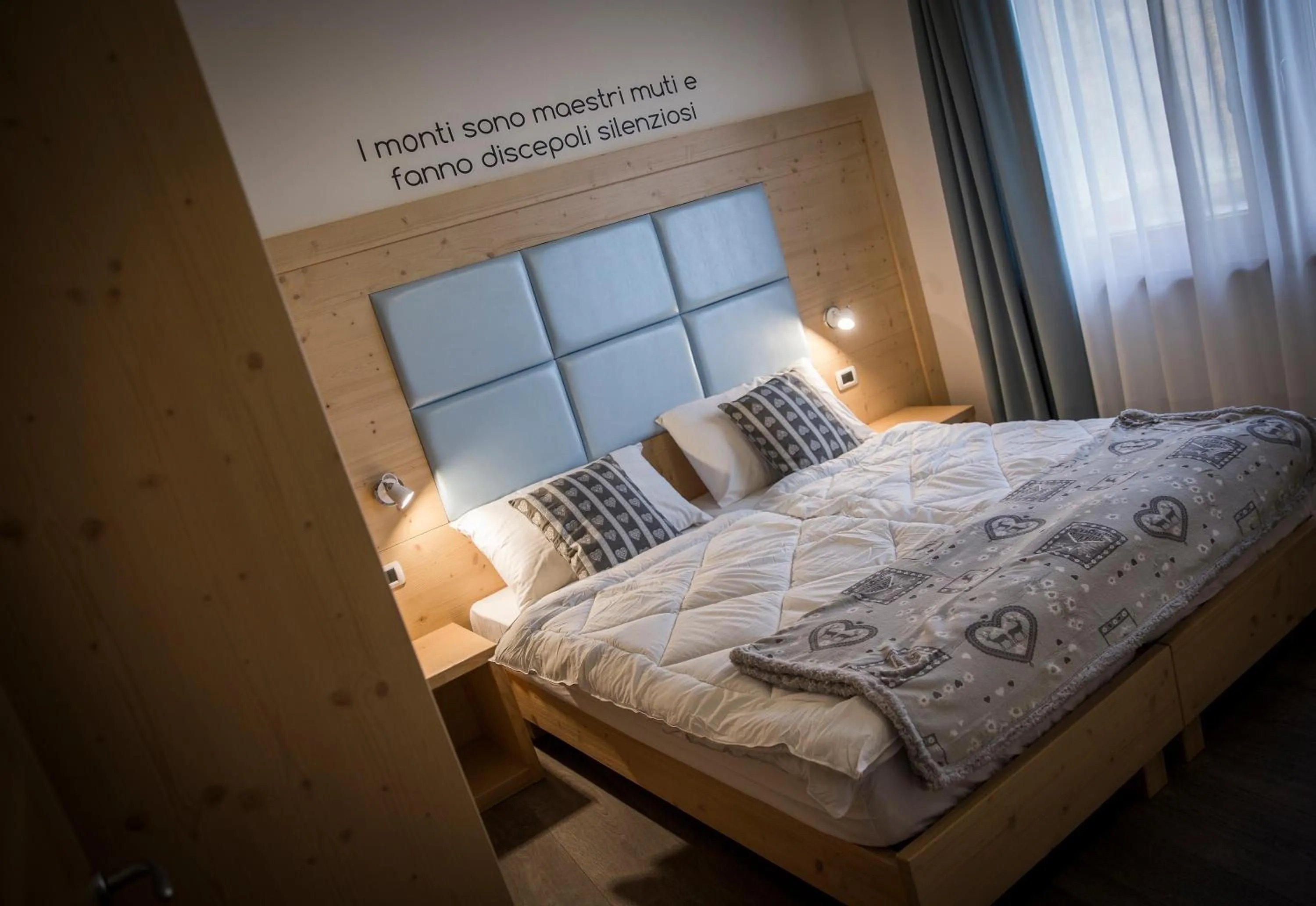 Decorative detail, Bed in Aparthotel Dolomites Living&Relax