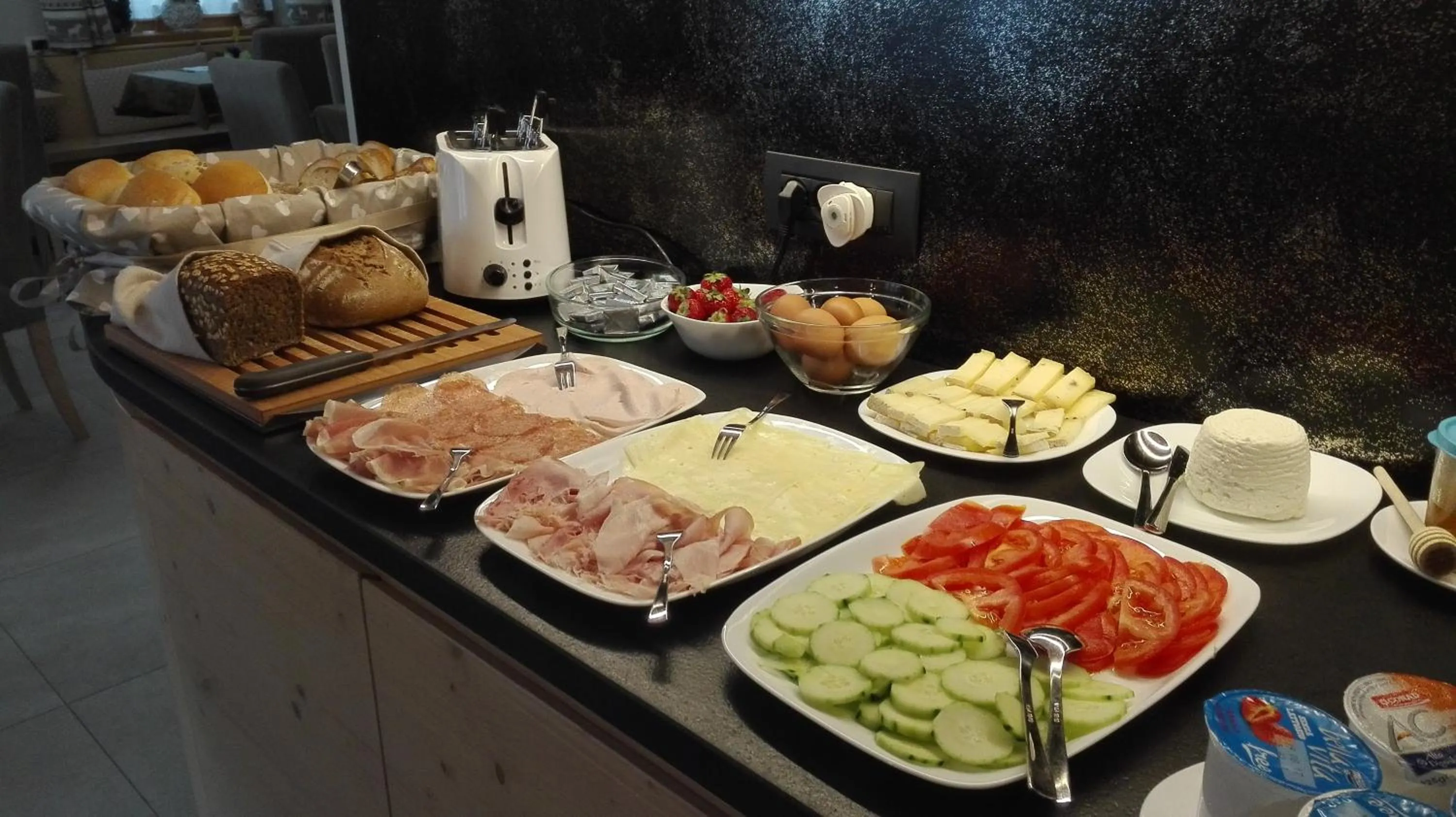 Buffet breakfast in Aparthotel Dolomites Living&Relax