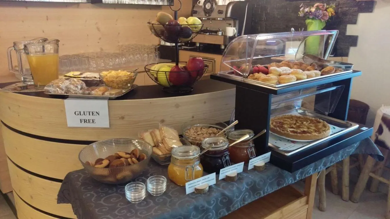 Buffet breakfast in Aparthotel Dolomites Living&Relax