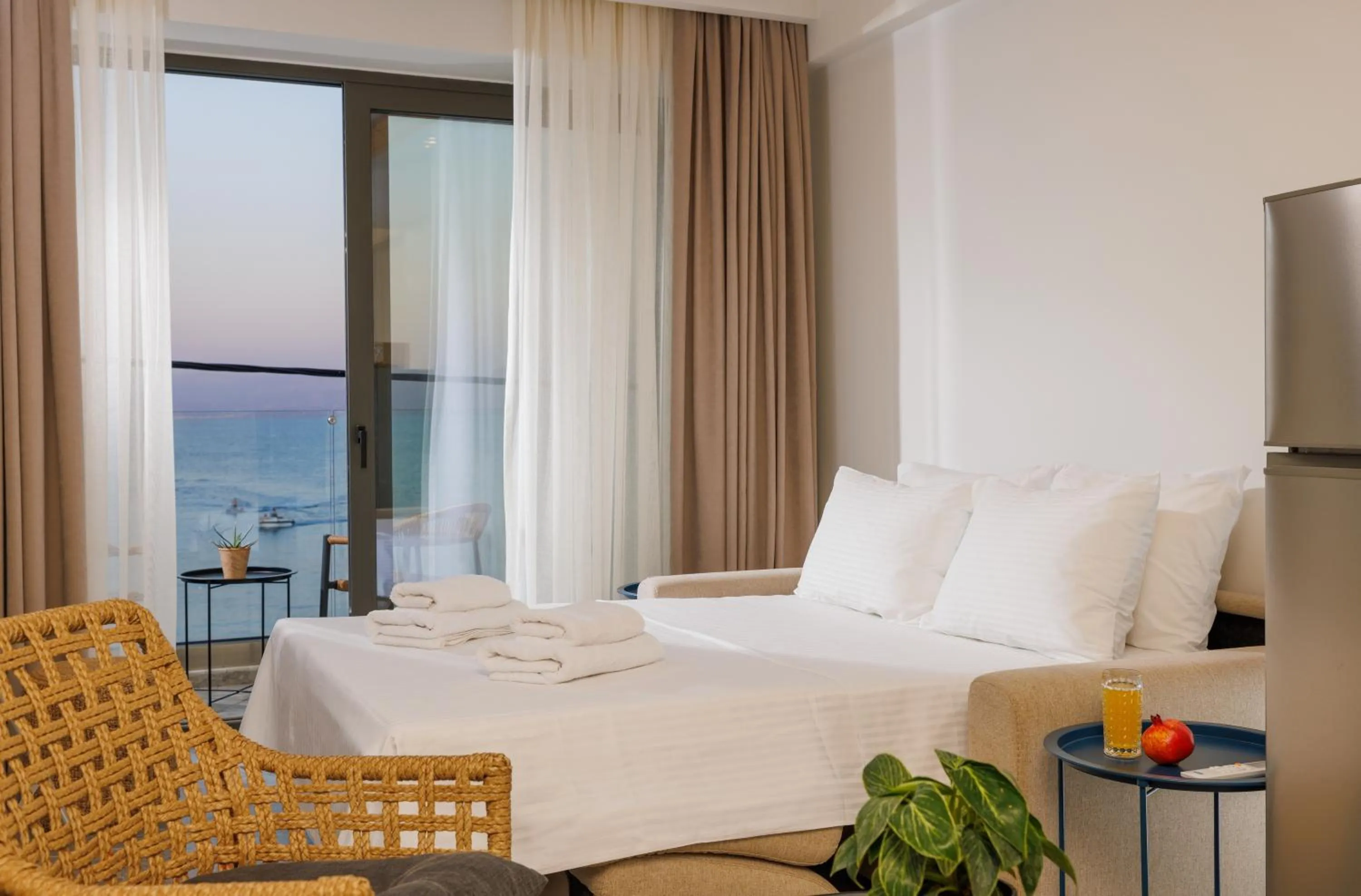 Photo of the whole room, Bed in Soho SeaFront Suites