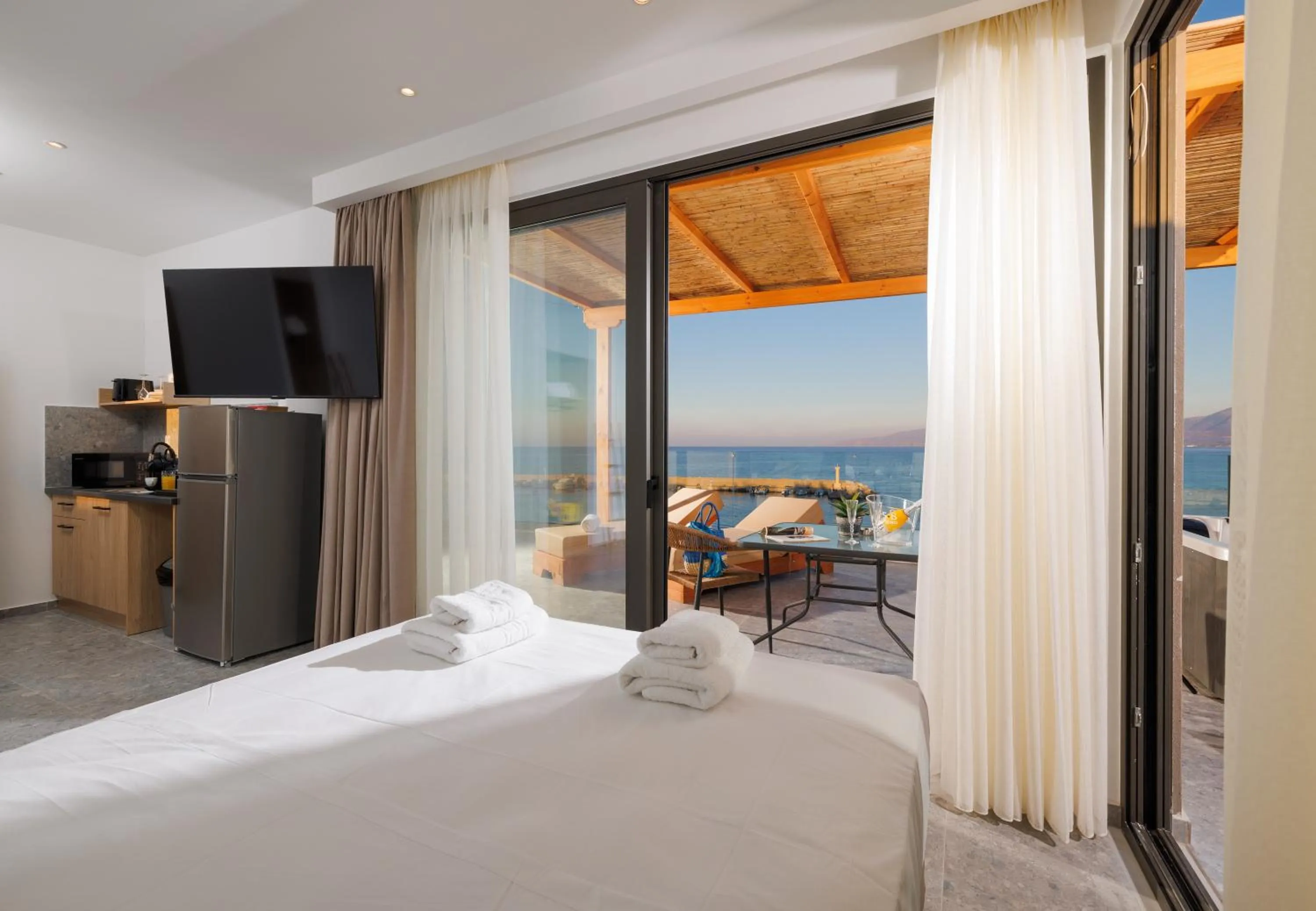 Photo of the whole room, Bed in Soho SeaFront Suites