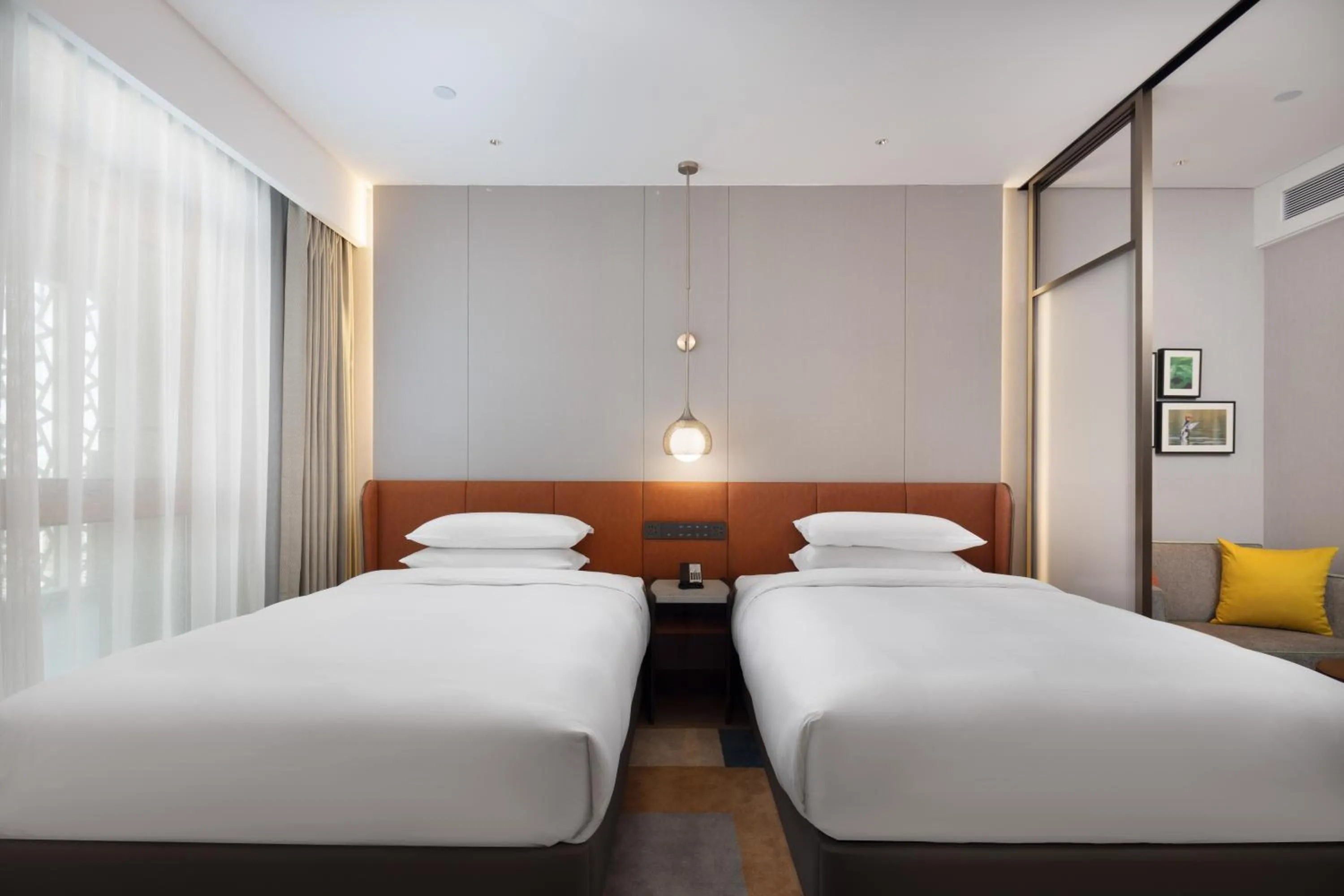 Bed in Home2 Suite by Hilton Binzhou Boxing