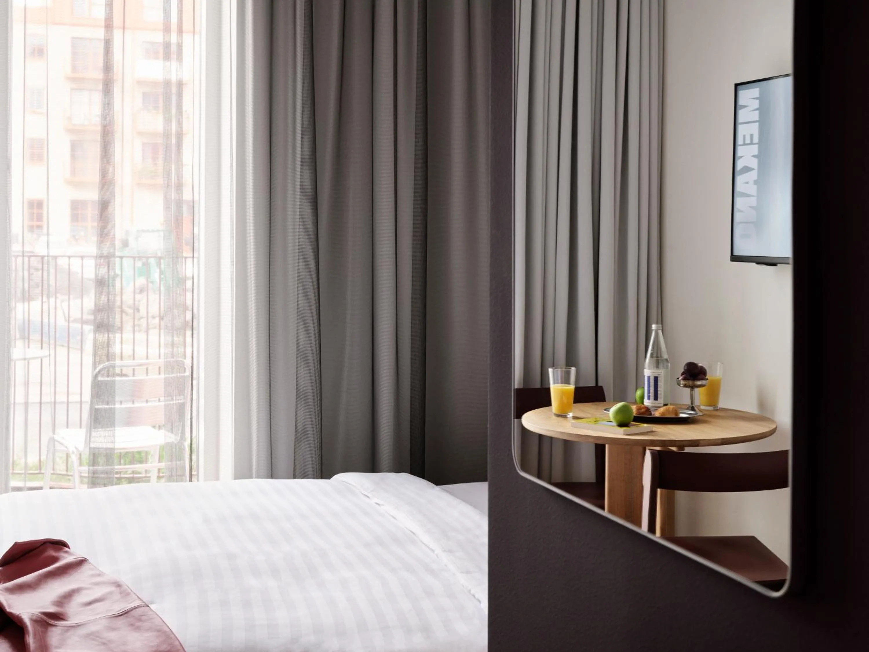 Bed in Mekano Apartment Hotel