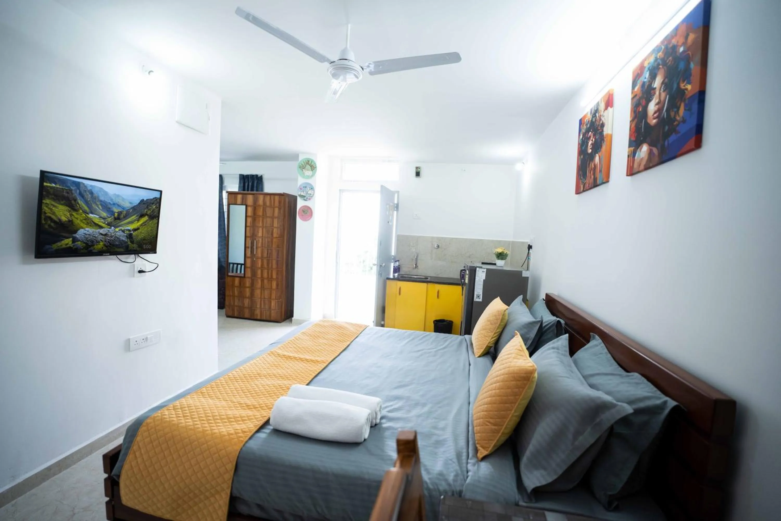 Photo of the whole room, Bed in Yellow Bells Studios And Suites