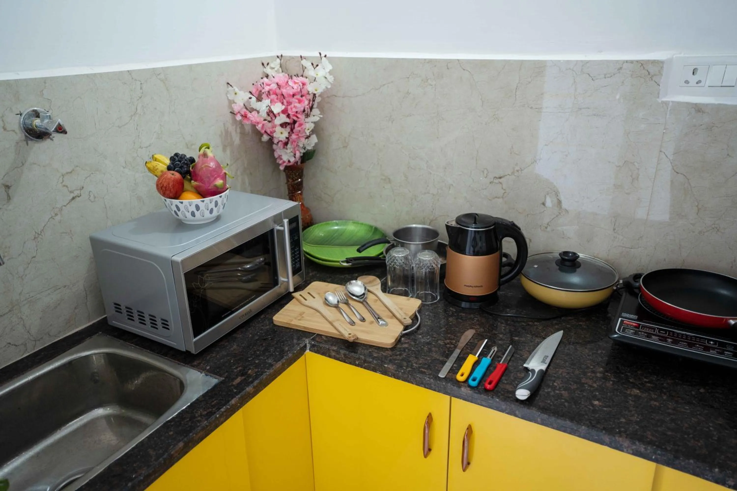 Kitchen or kitchenette in Yellow Bells Studios And Suites