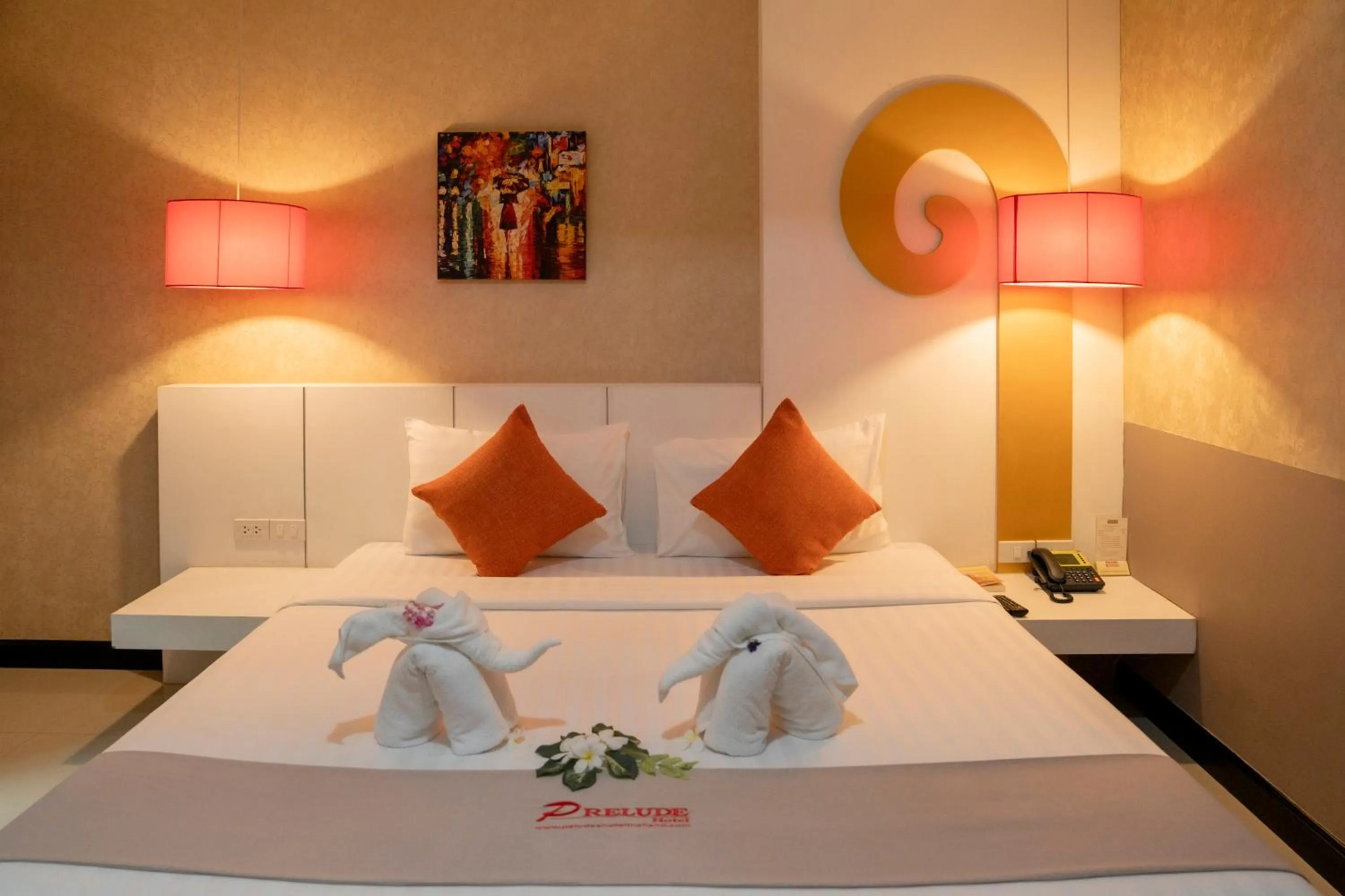 Bed in Prelude Hotel