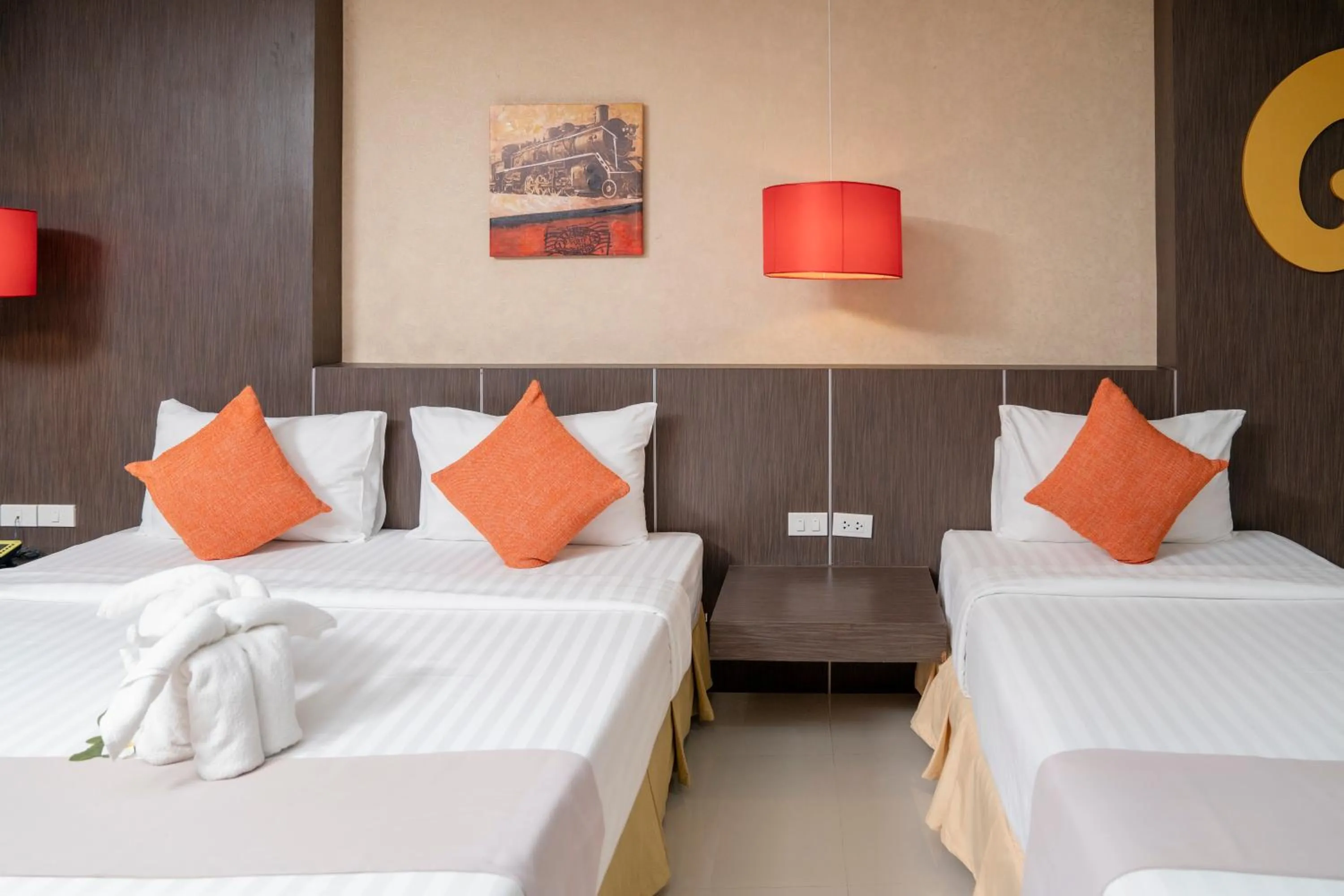 Bed in Prelude Hotel