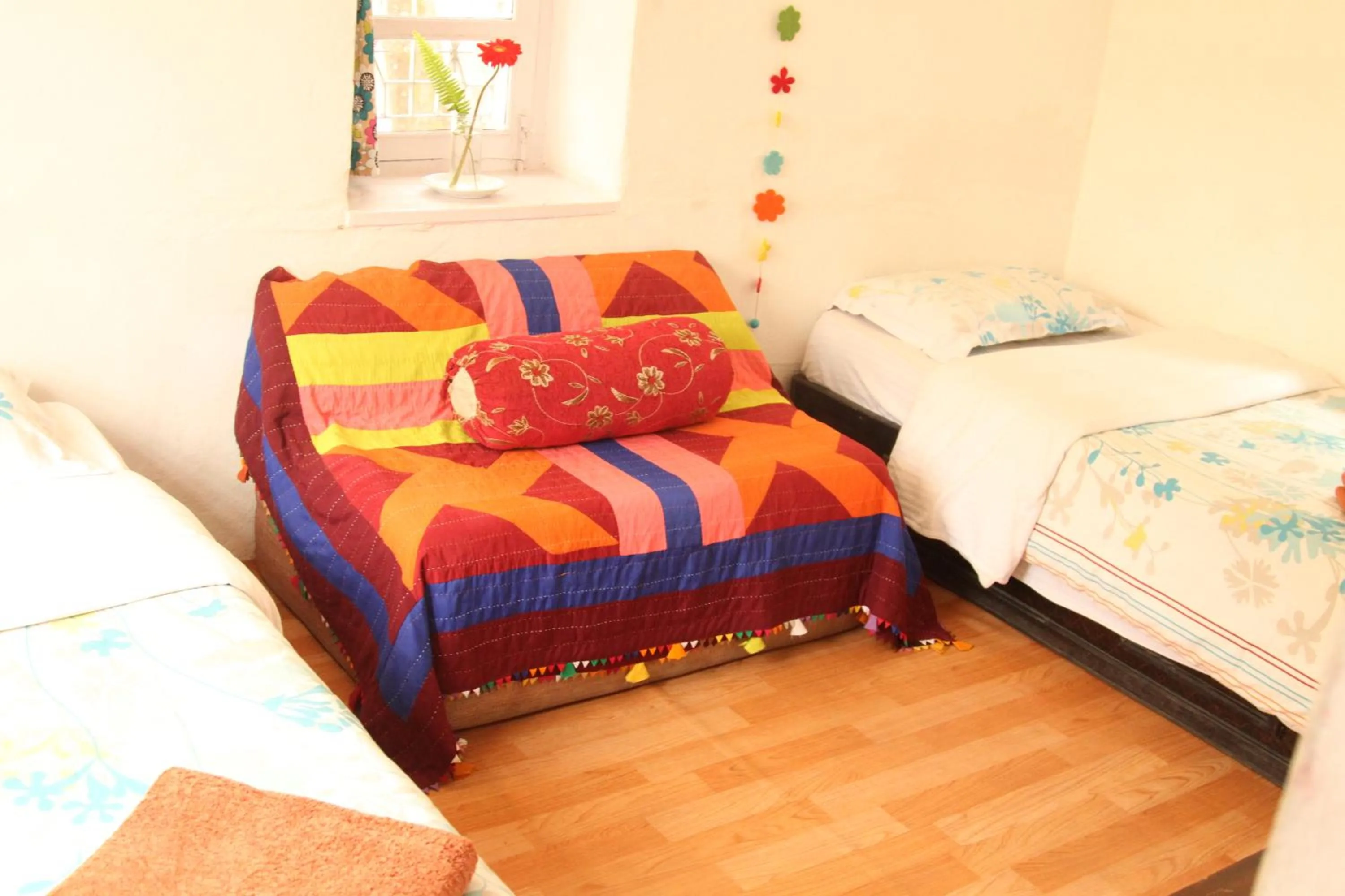 Bed in Cocina Mitho Chha BNB