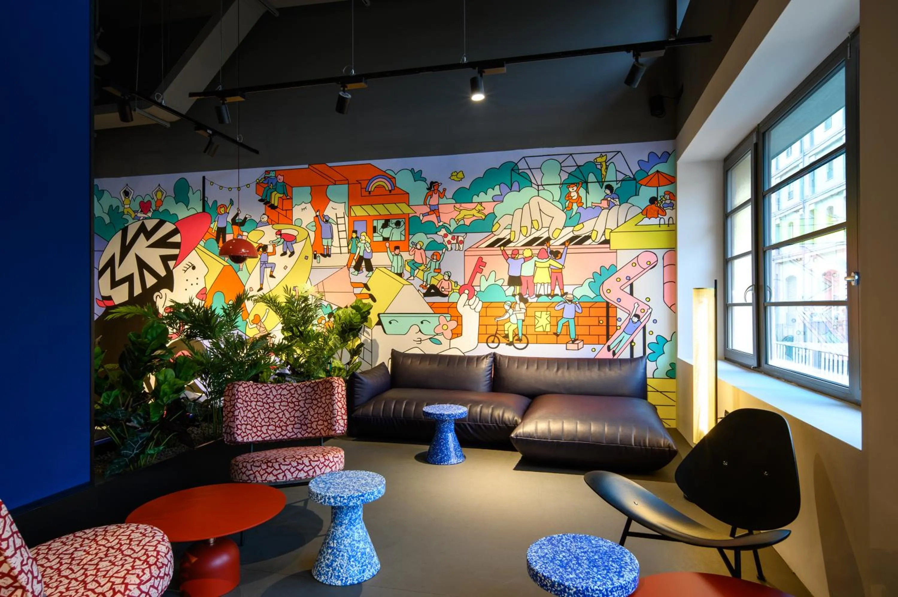 Seating area in CX Milan Bicocca