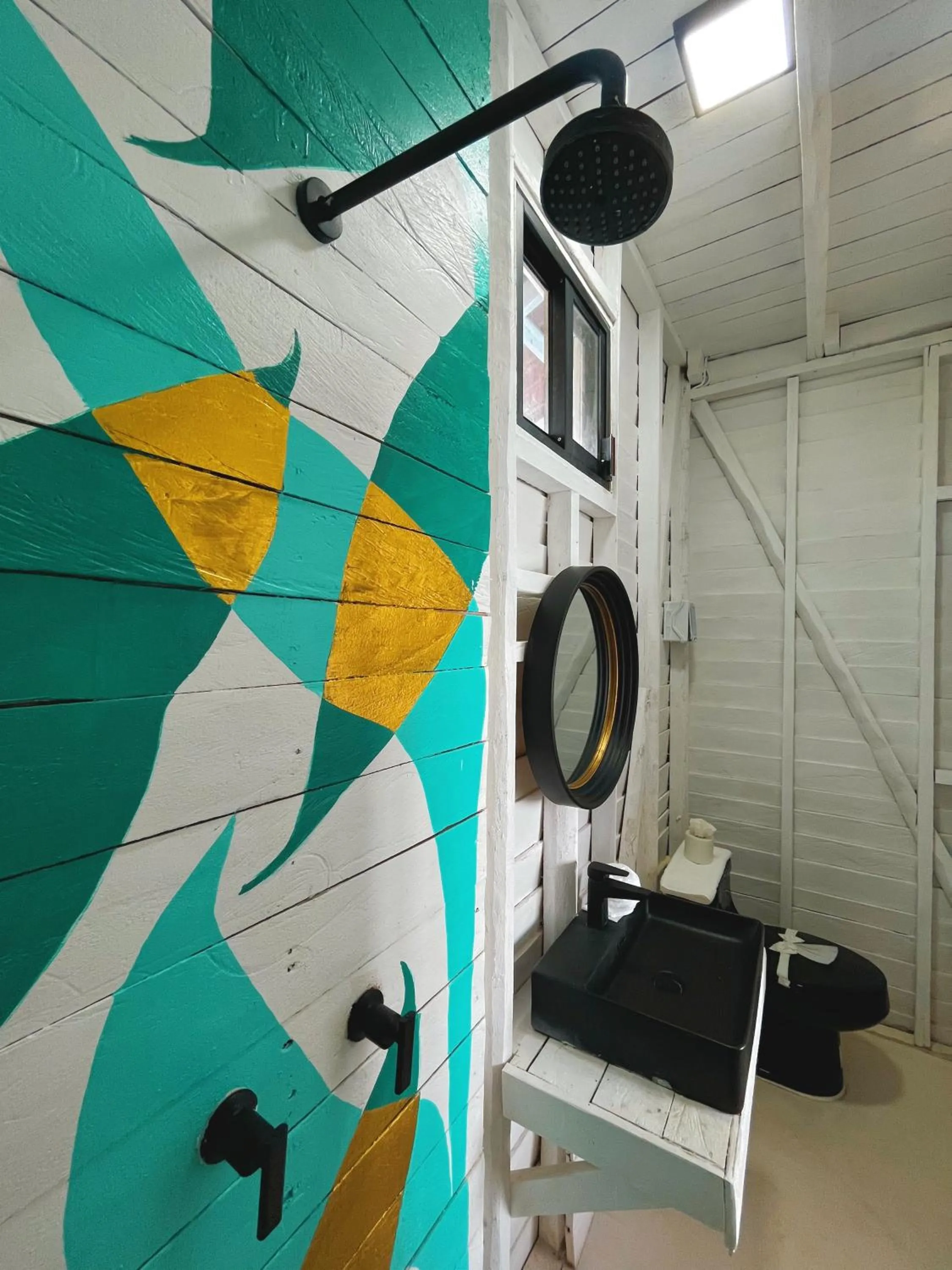 Bathroom in El Faro Beach Front by ÓOL Hotels