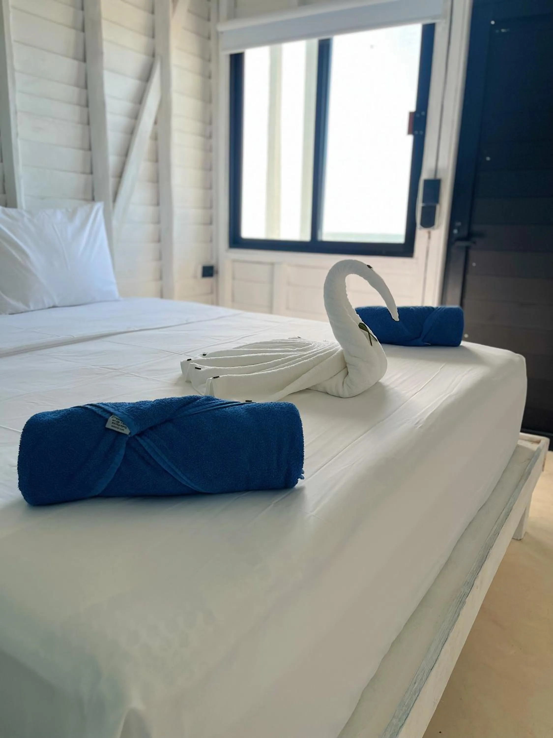 Bed in El Faro Beach Front by ÓOL Hotels
