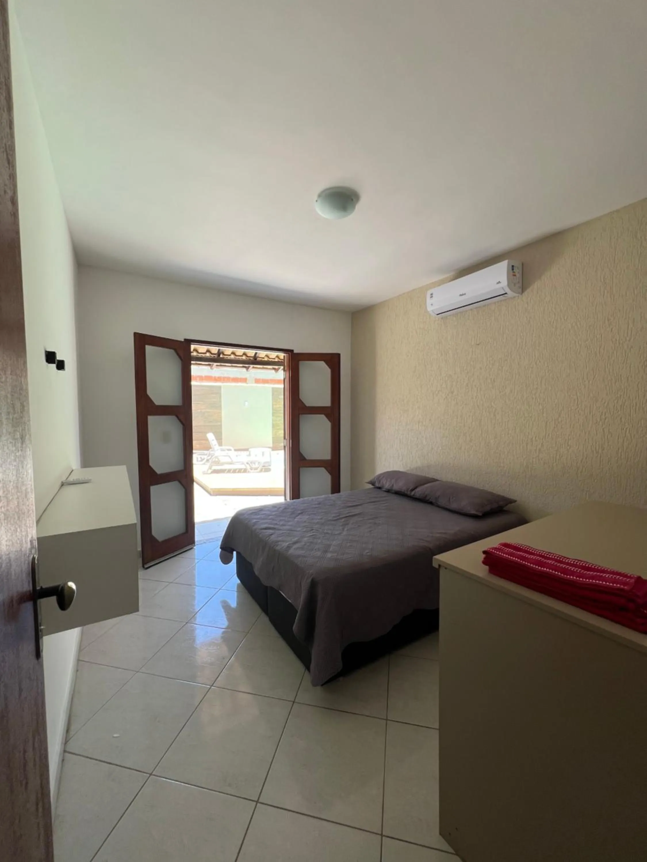 Bed in Casa com piscina, churrasqueira e ar condicionado em condomínio