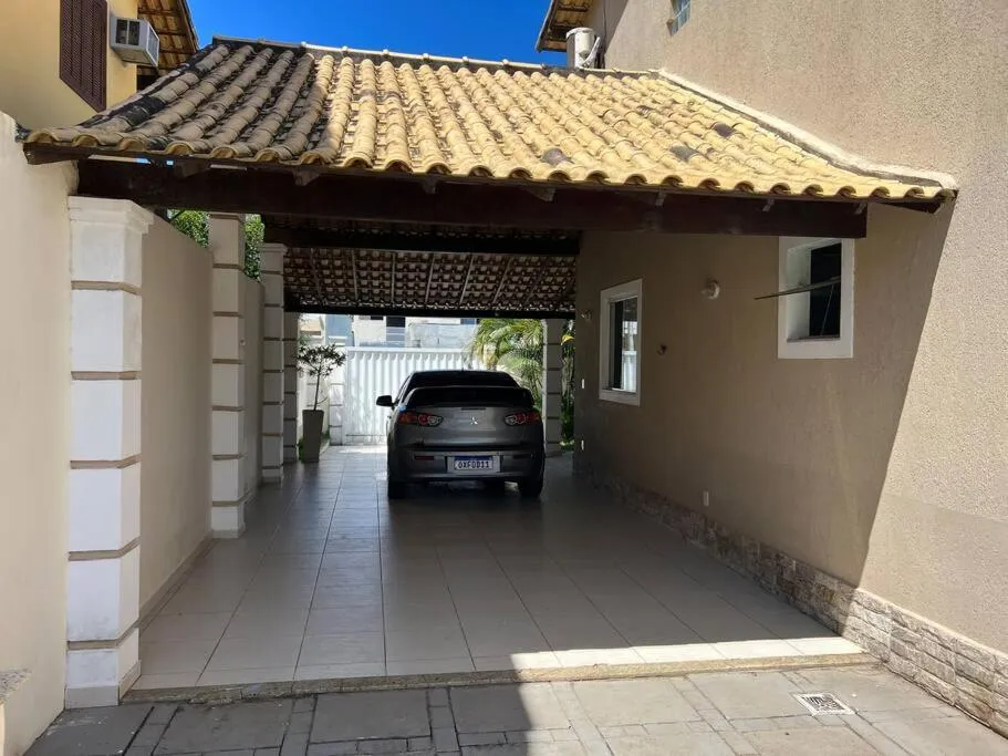 Casa com piscina, churrasqueira e ar condicionado em condomínio