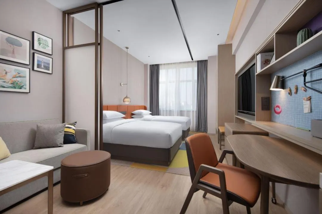 Bed in Home2 Suite by Hilton Yantai Laishan