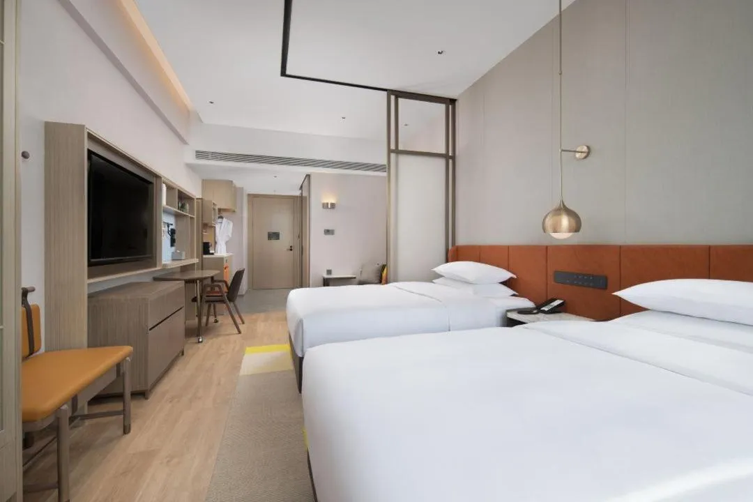 Bed in Home2 Suite by Hilton Yantai Laishan