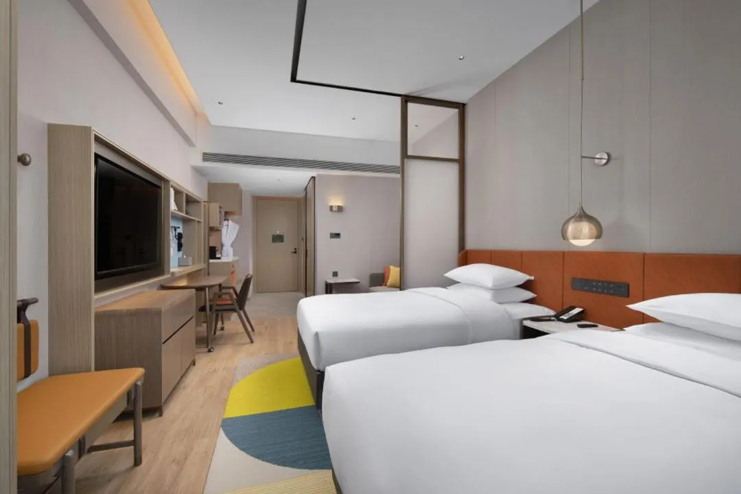 Bed in Home2 Suite by Hilton Yantai Laishan