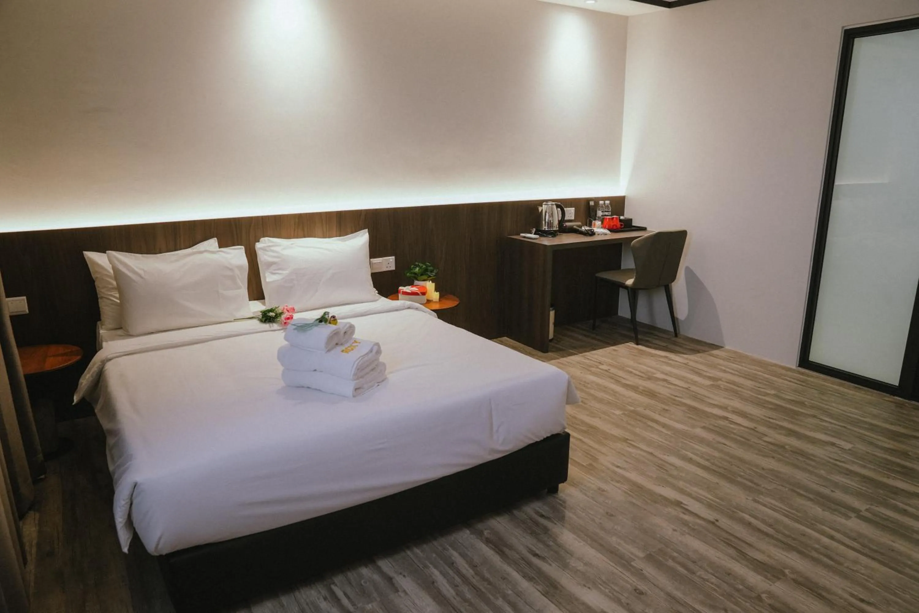 Bed in Roxy Hotel Siniawan