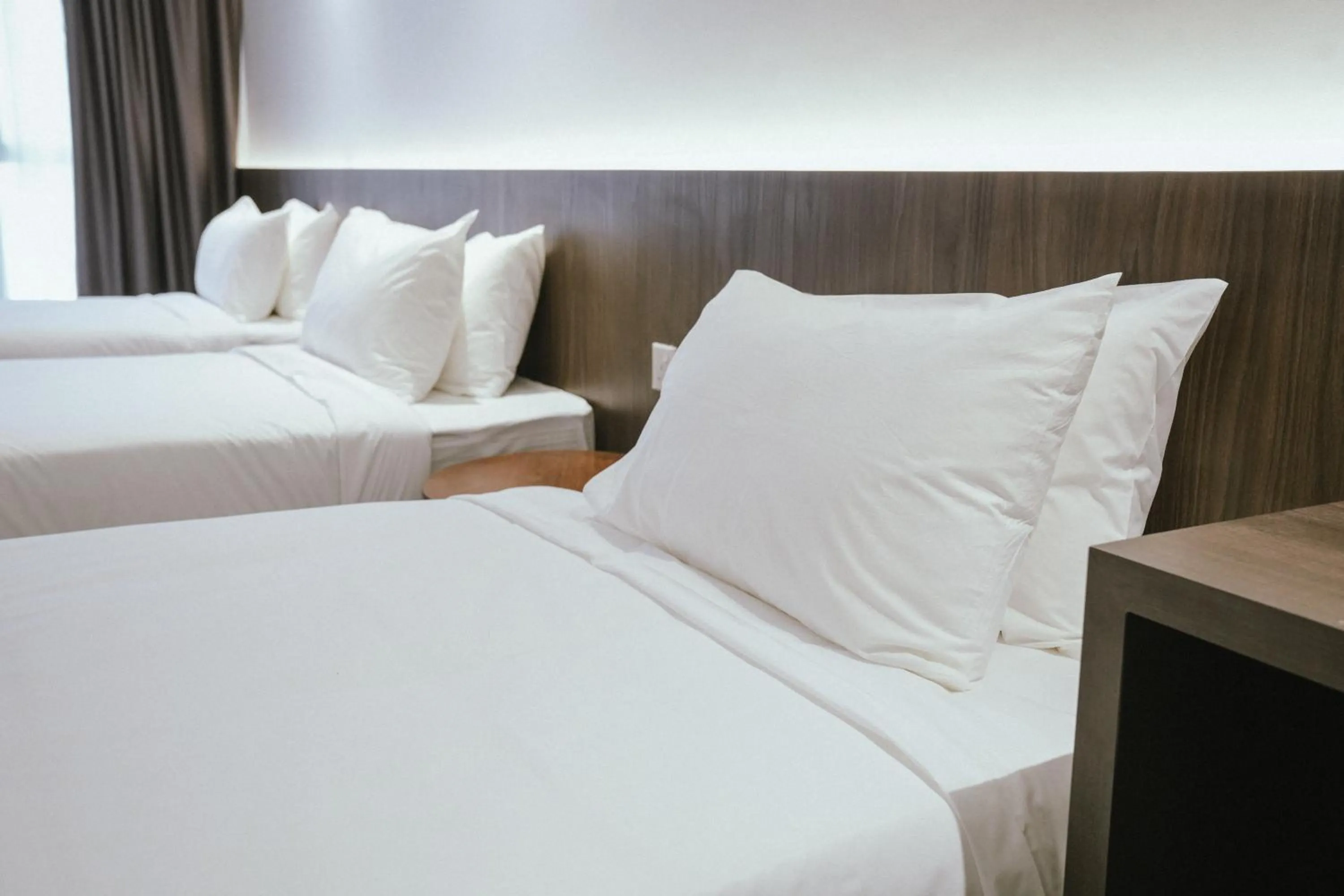 Bed in Roxy Hotel Siniawan