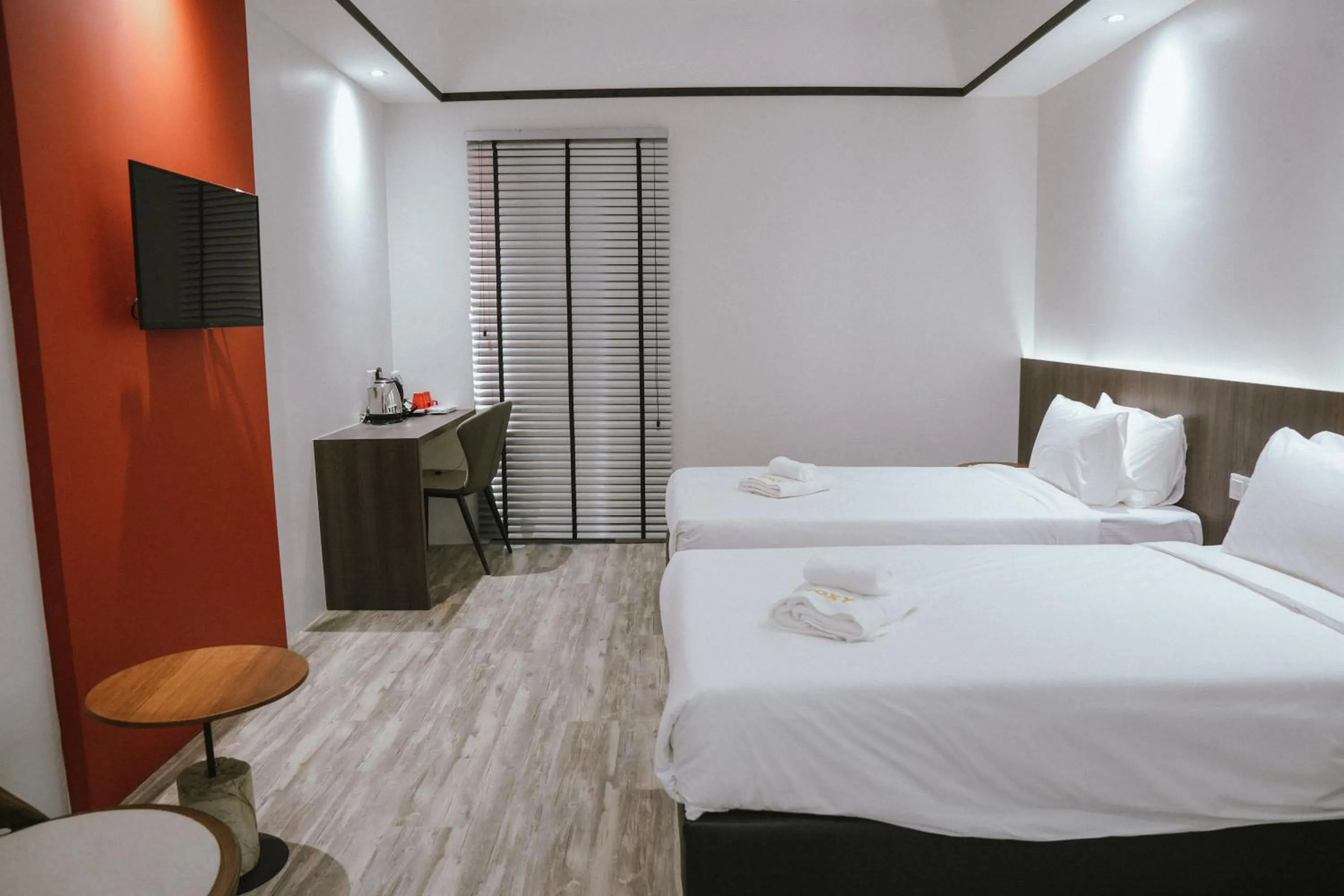 Bed in Roxy Hotel Siniawan