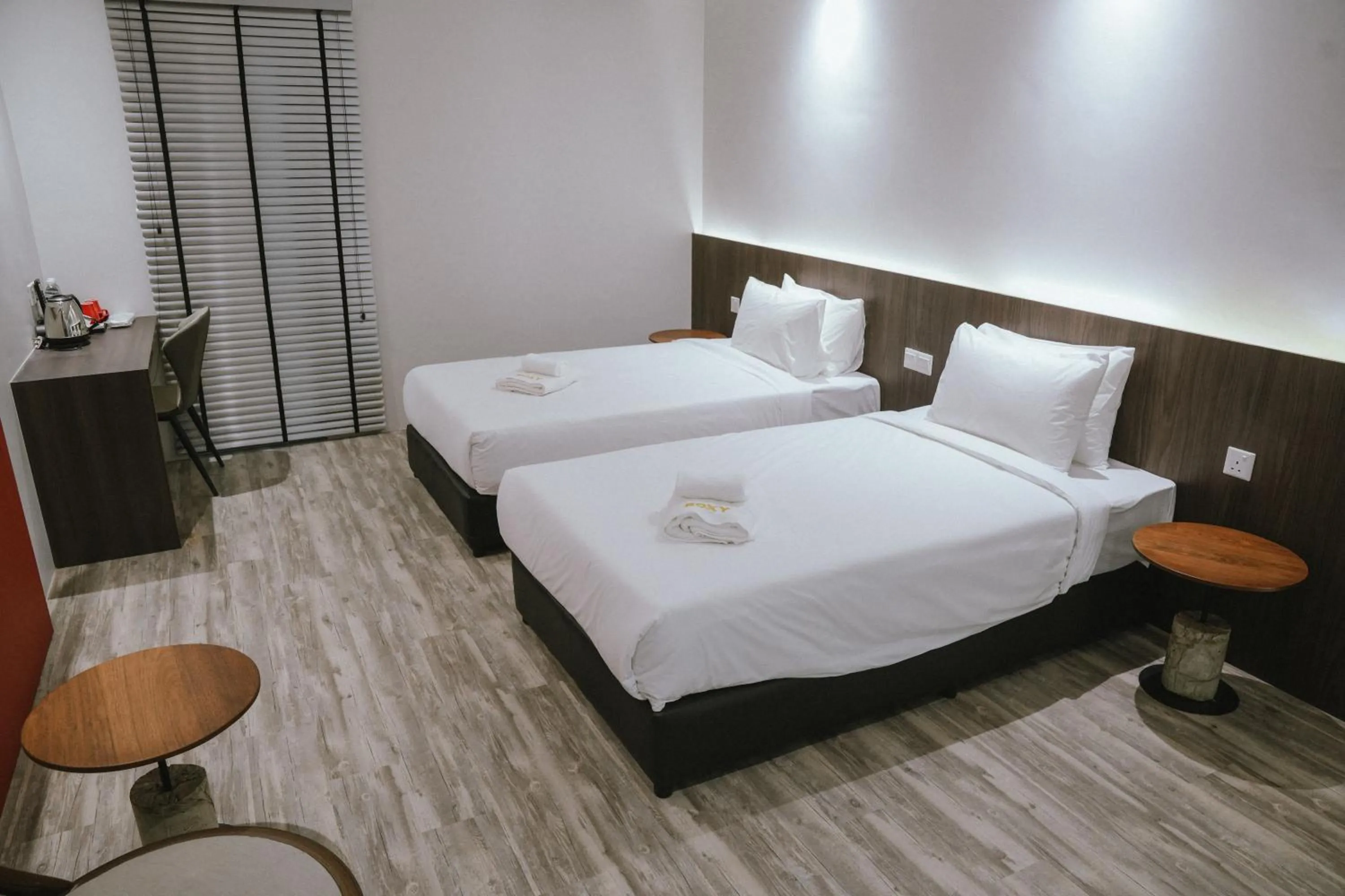 Bed in Roxy Hotel Siniawan