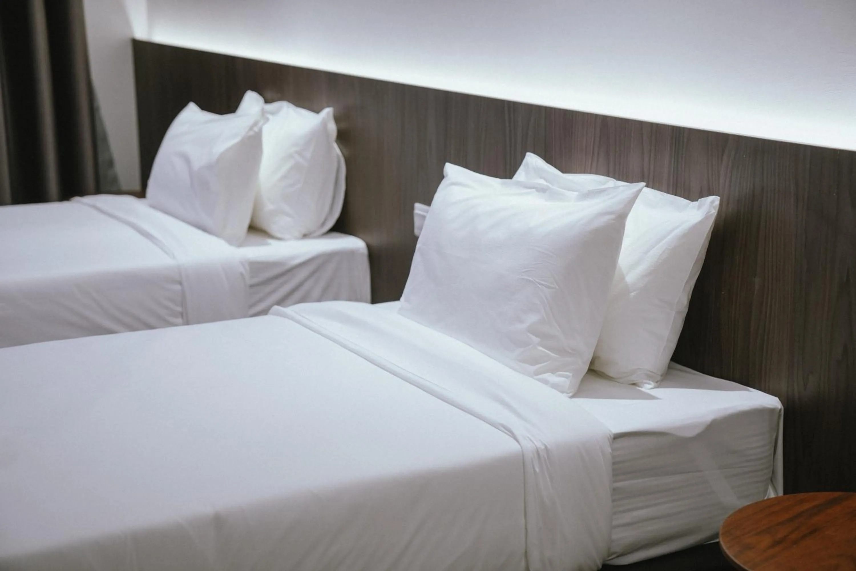 Bed in Roxy Hotel Siniawan