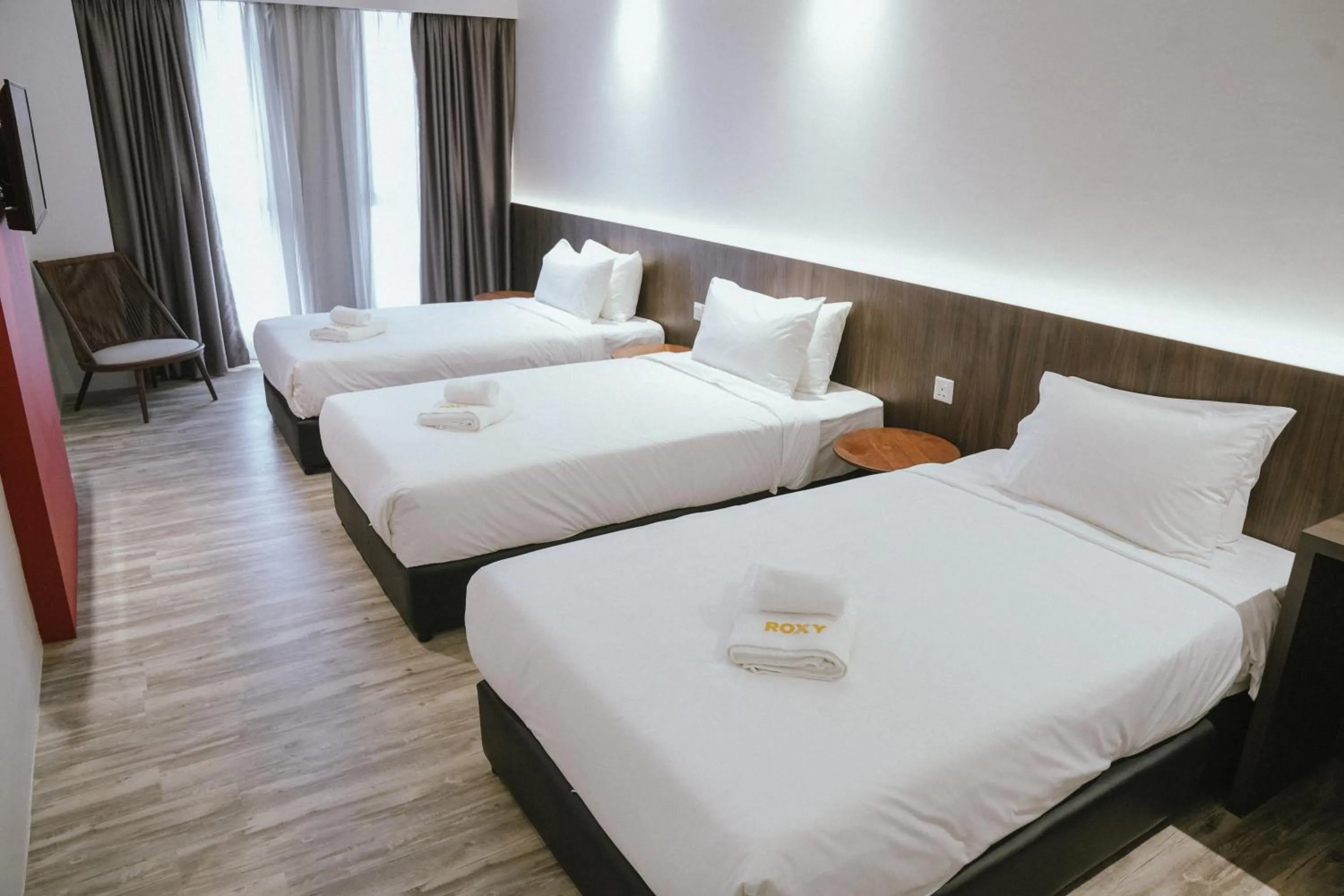 Bed in Roxy Hotel Siniawan