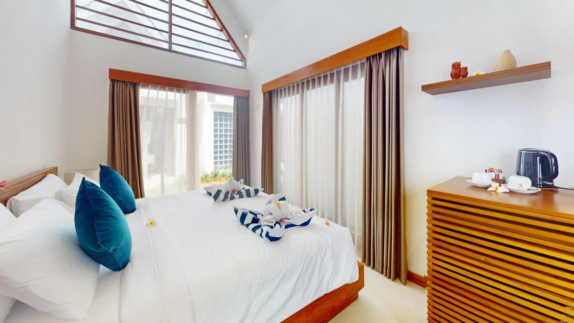 Bed in Segara Seaside Resort