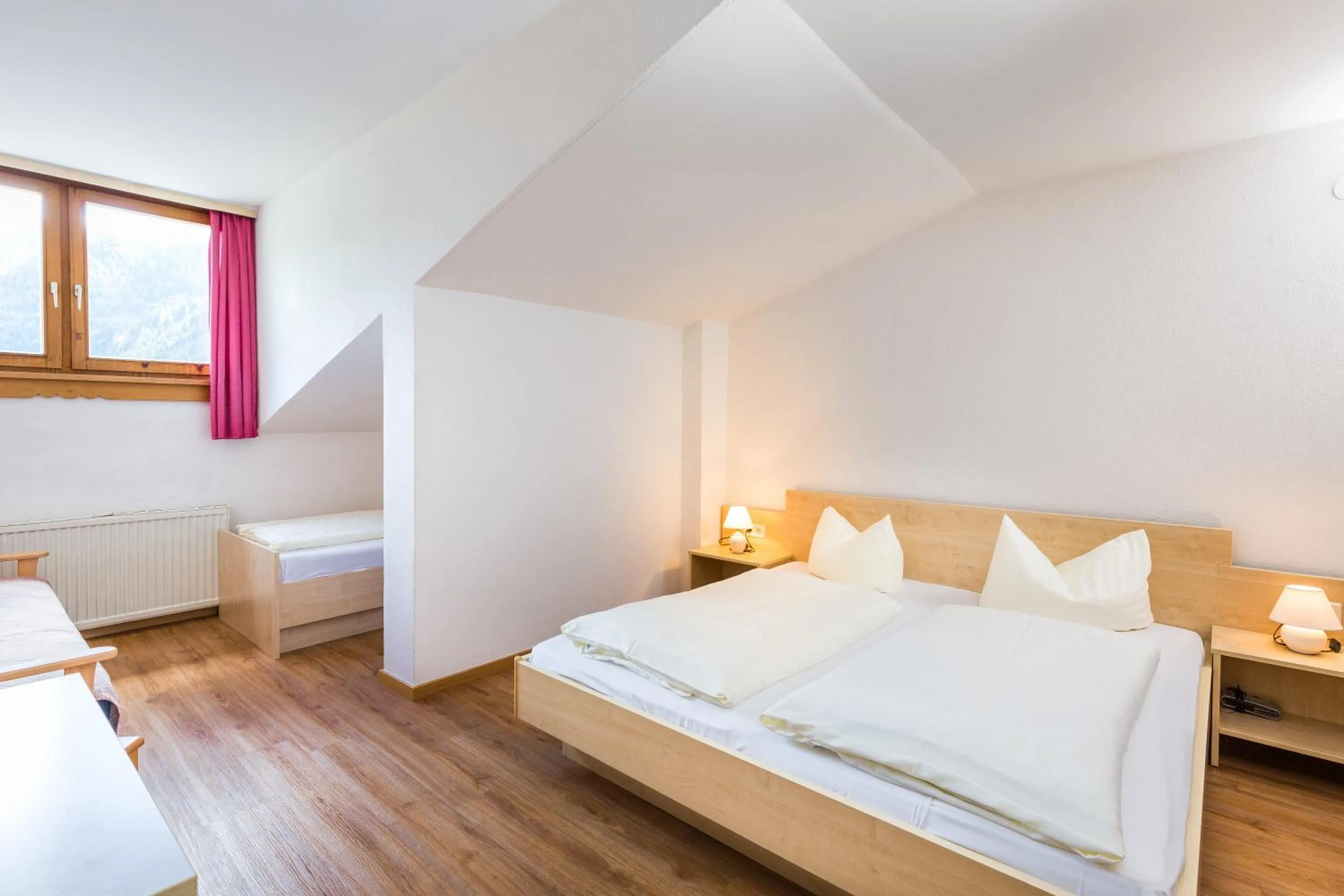 Bed in Hotel Grissemann