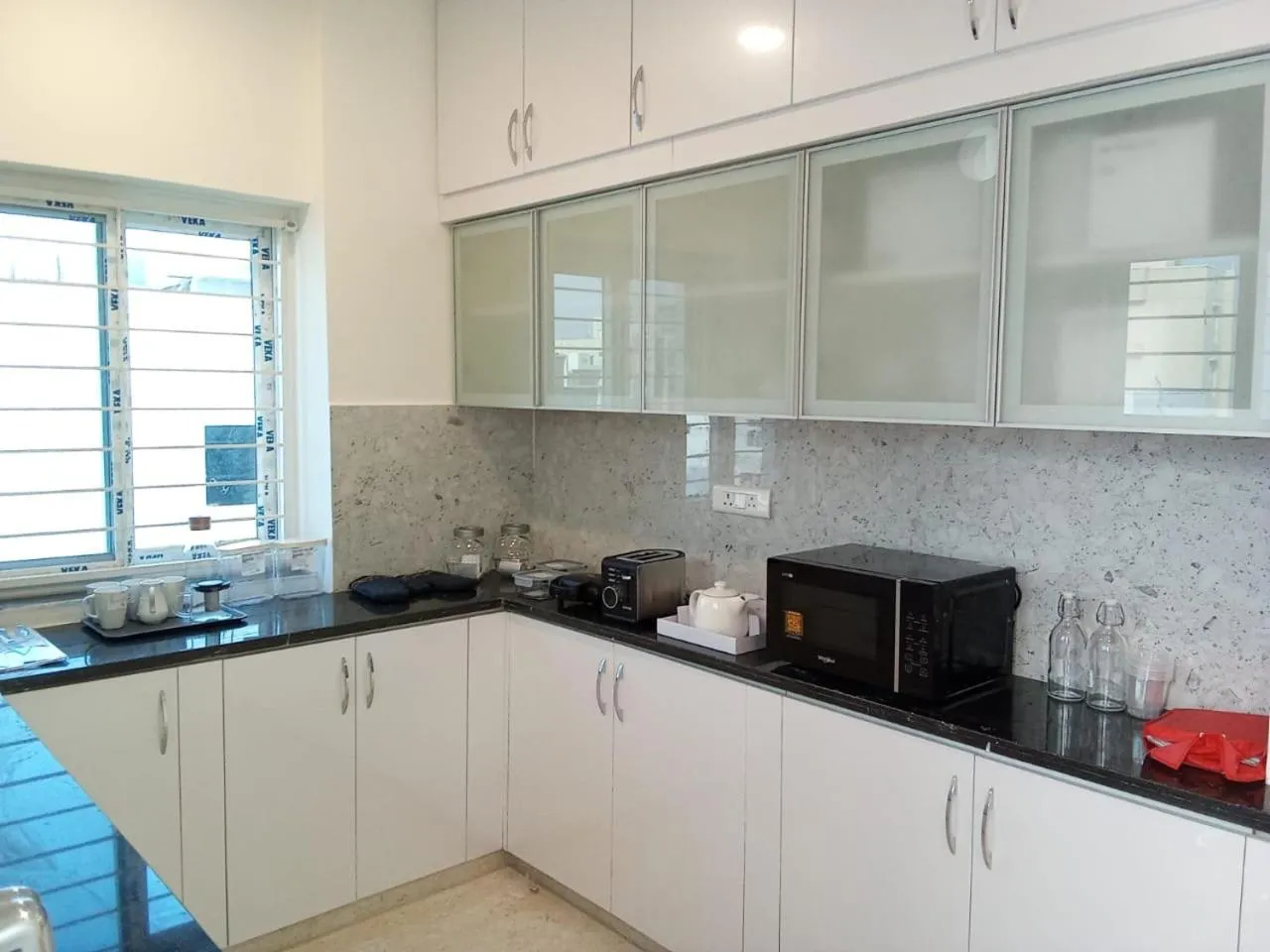 kitchen in Enkay Service Apartments
