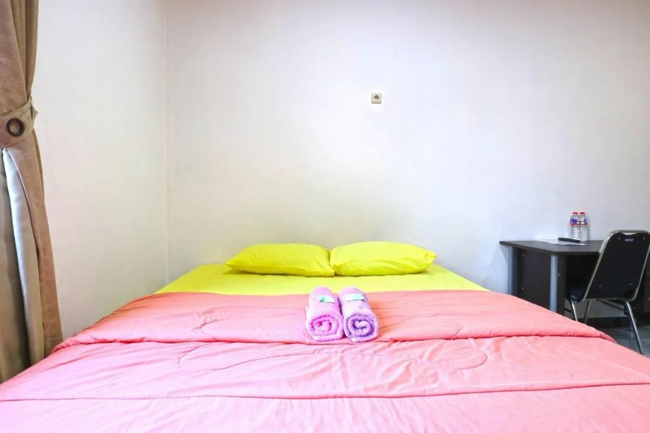 Bed in Saloka Guest House & Residence