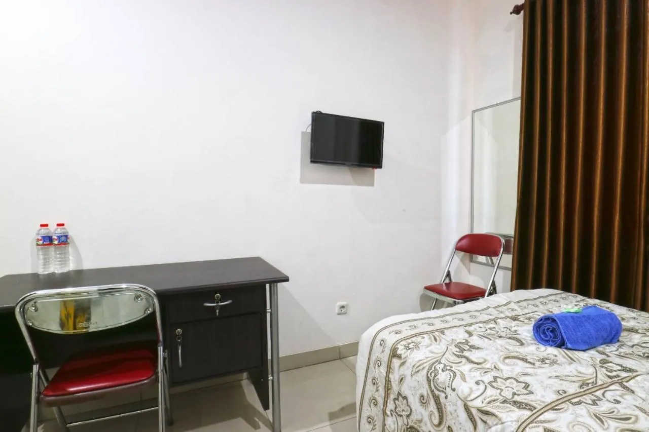 Bed in Saloka Guest House & Residence