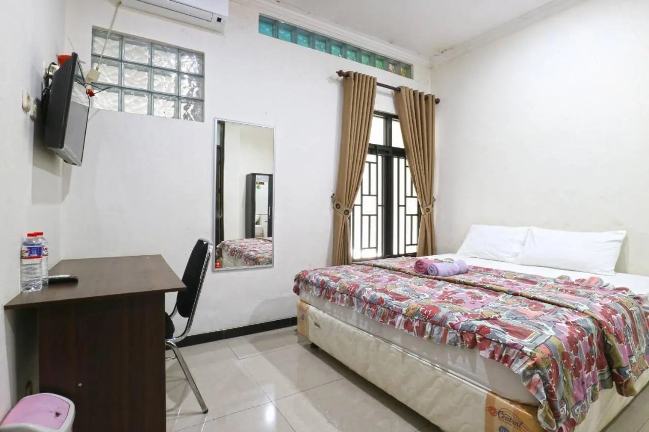 Bed in Saloka Guest House & Residence