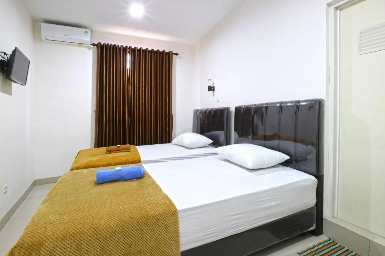 Bed in Saloka Guest House & Residence