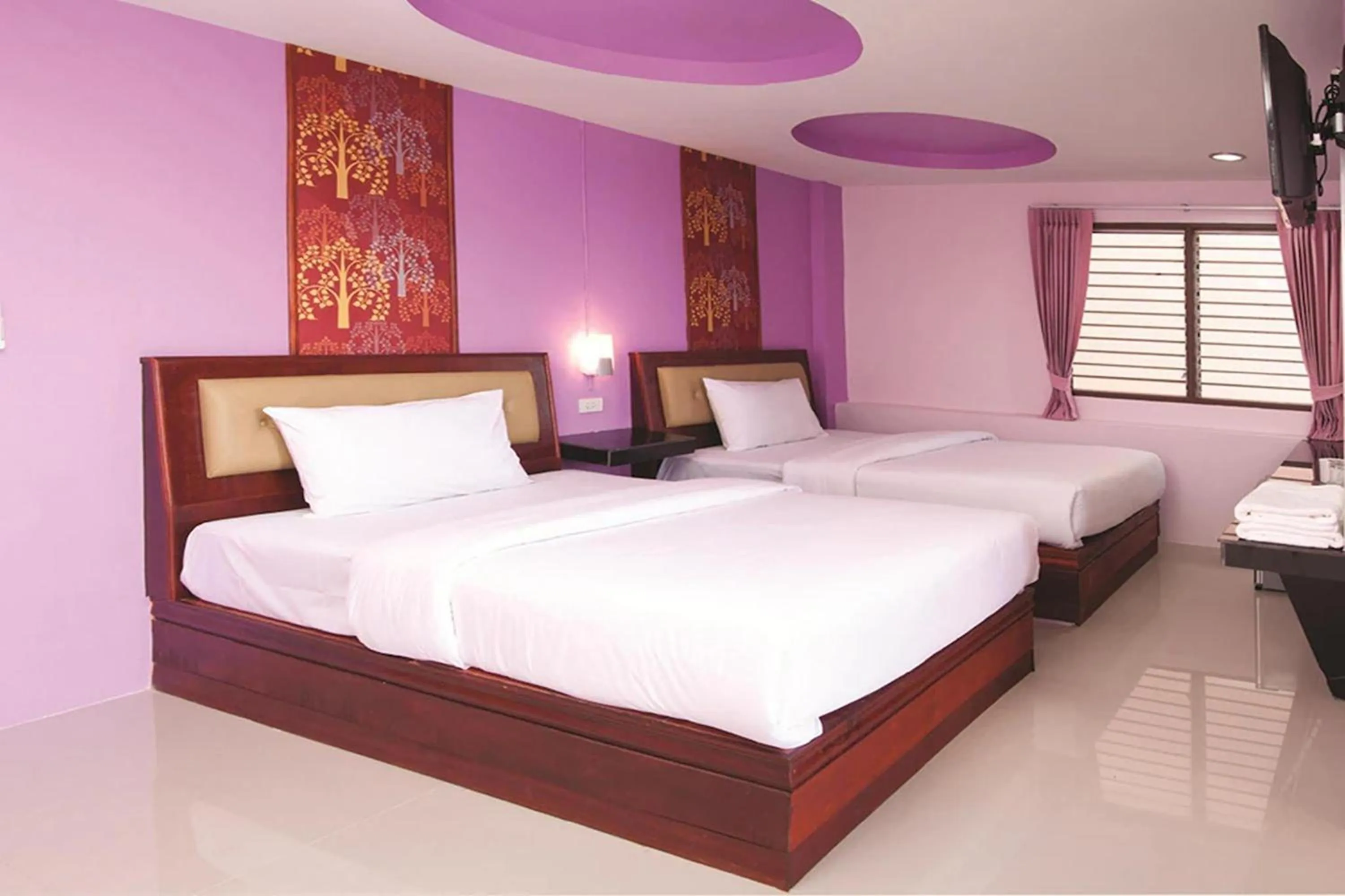 Bed in Krabi Orchid Hometel