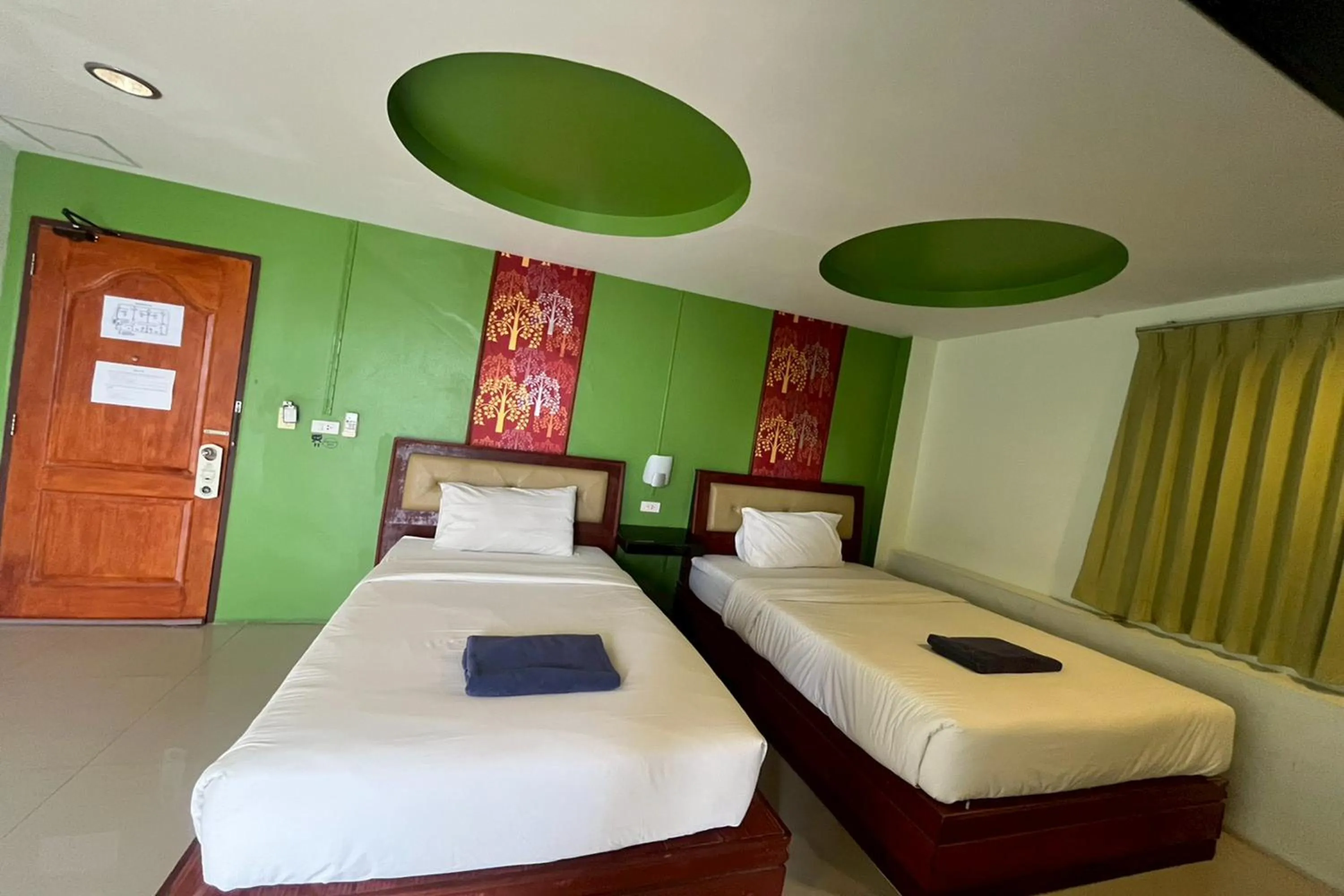 Bed in Krabi Orchid Hometel