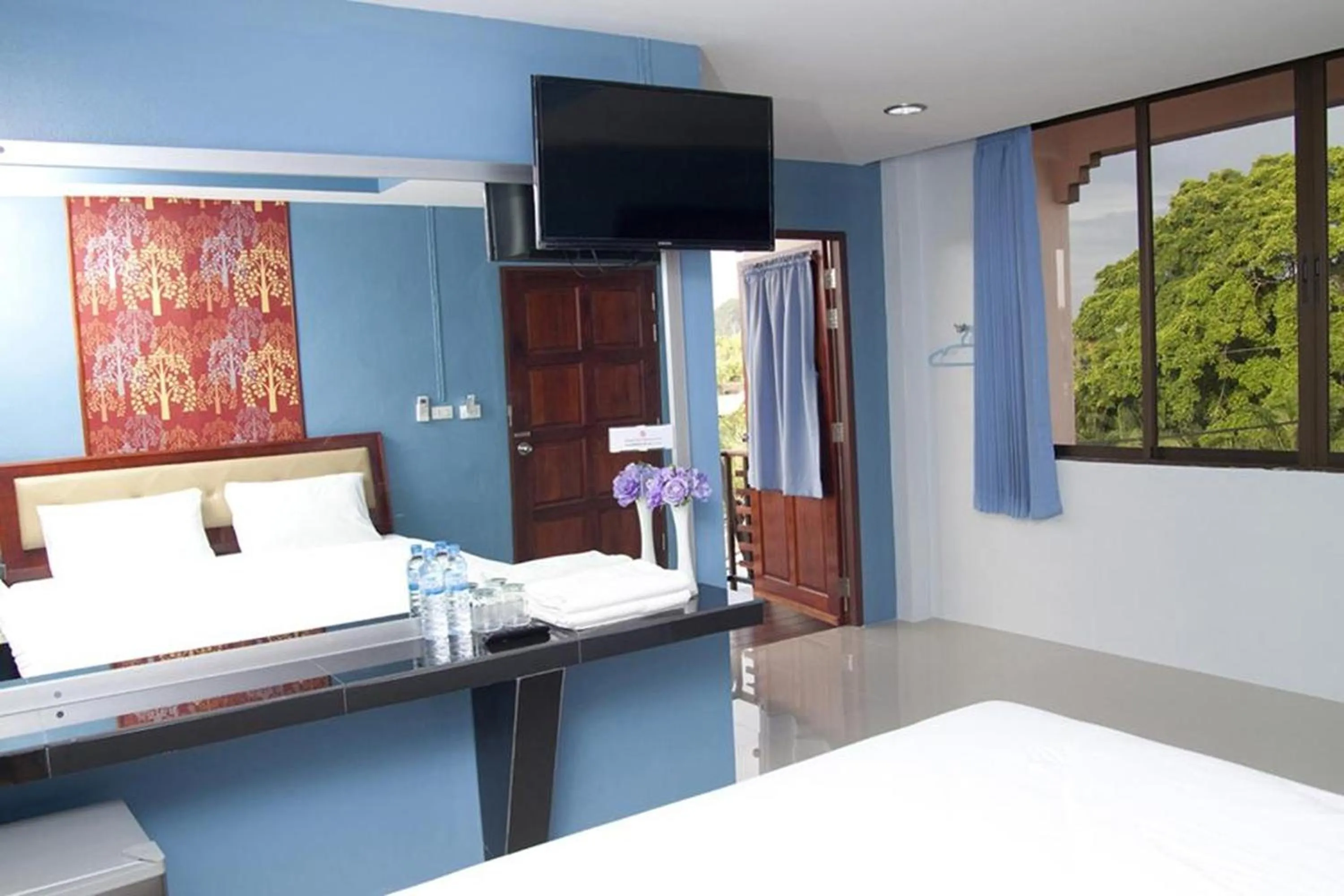 Bed in Krabi Orchid Hometel